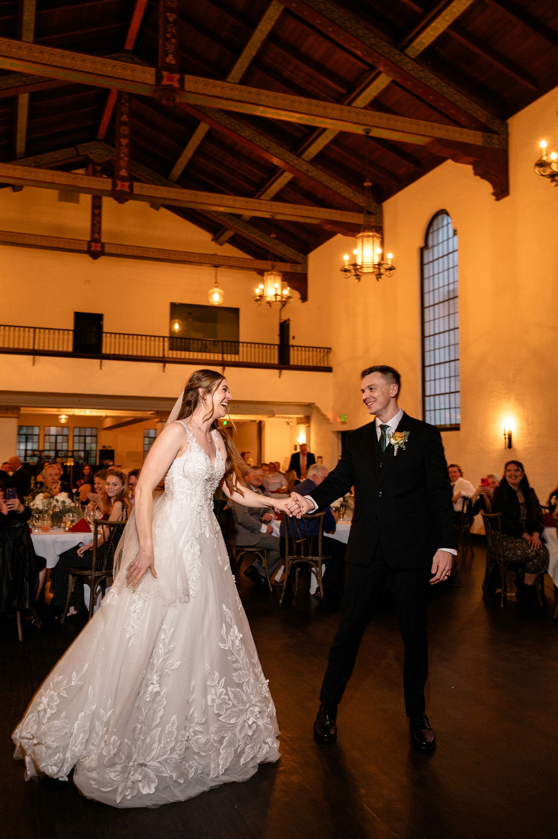 Flat lay wedding details with bouquet, rings, and sparkling bridal heels