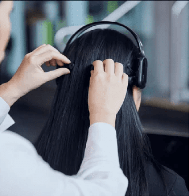 Researcher fitting Emotiv EEG headset