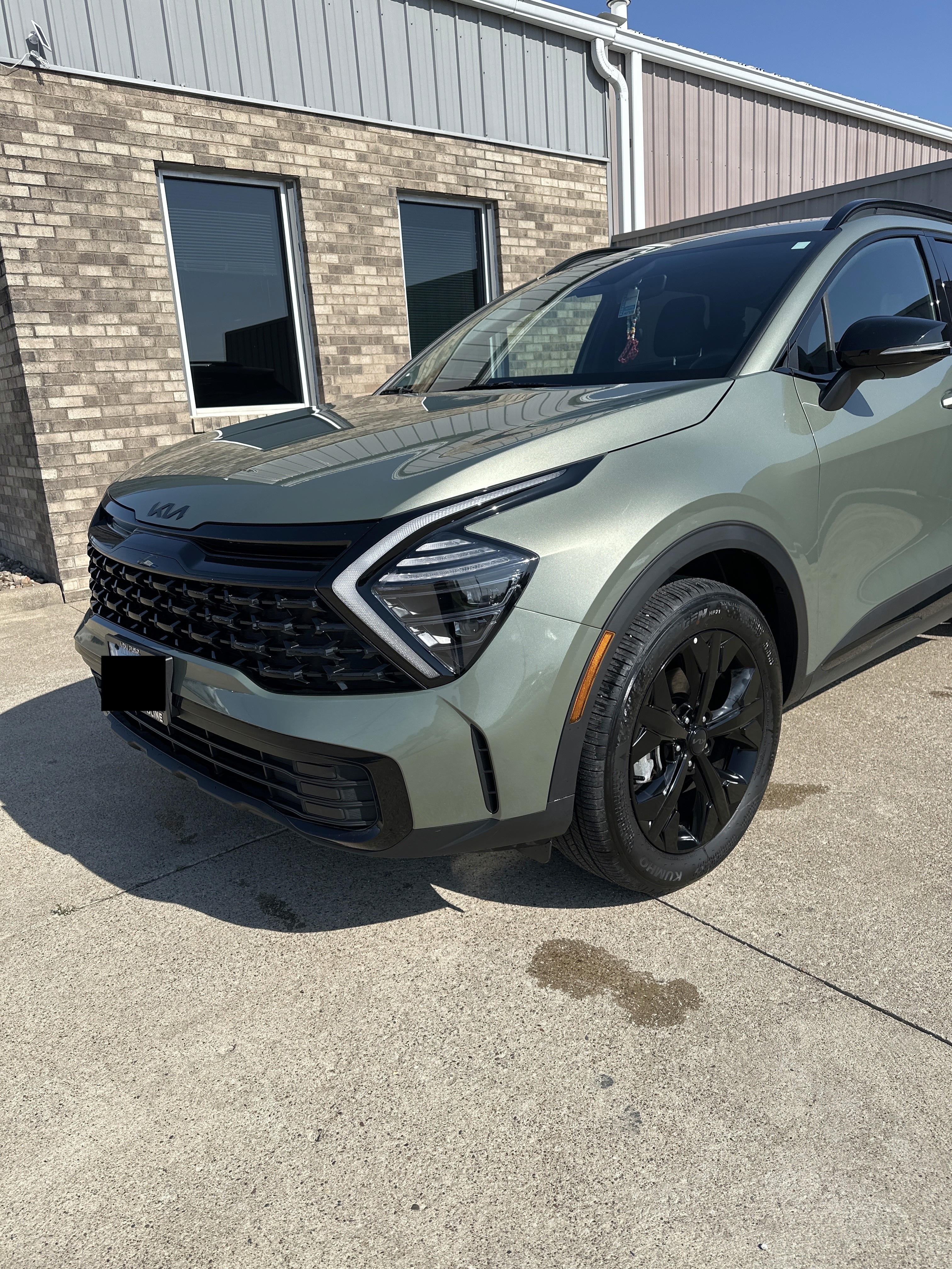 Kia SUV after collision repair that looks new