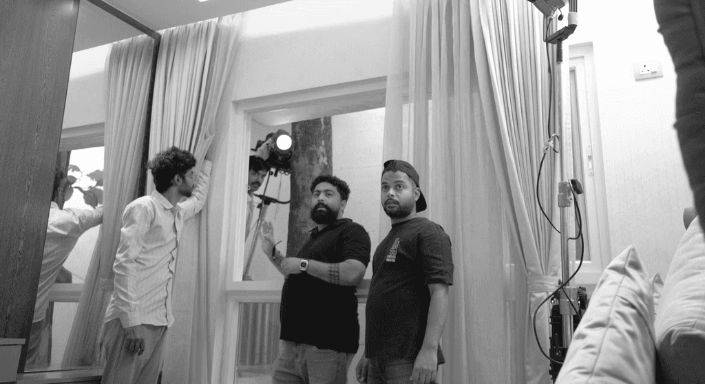 The founder of Red Productions managing a production shoot