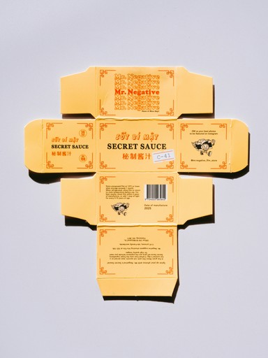 Unfolded yellow box with "secret sauce" text.