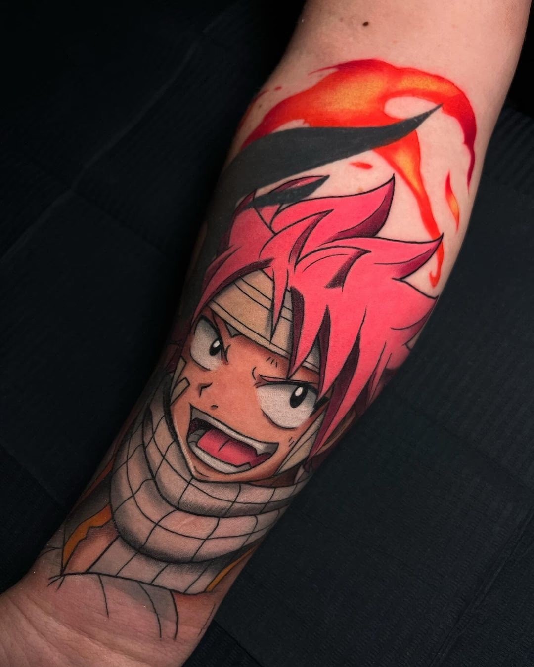 colorful anime tattoo of natsu smiling from the anime fairy tale