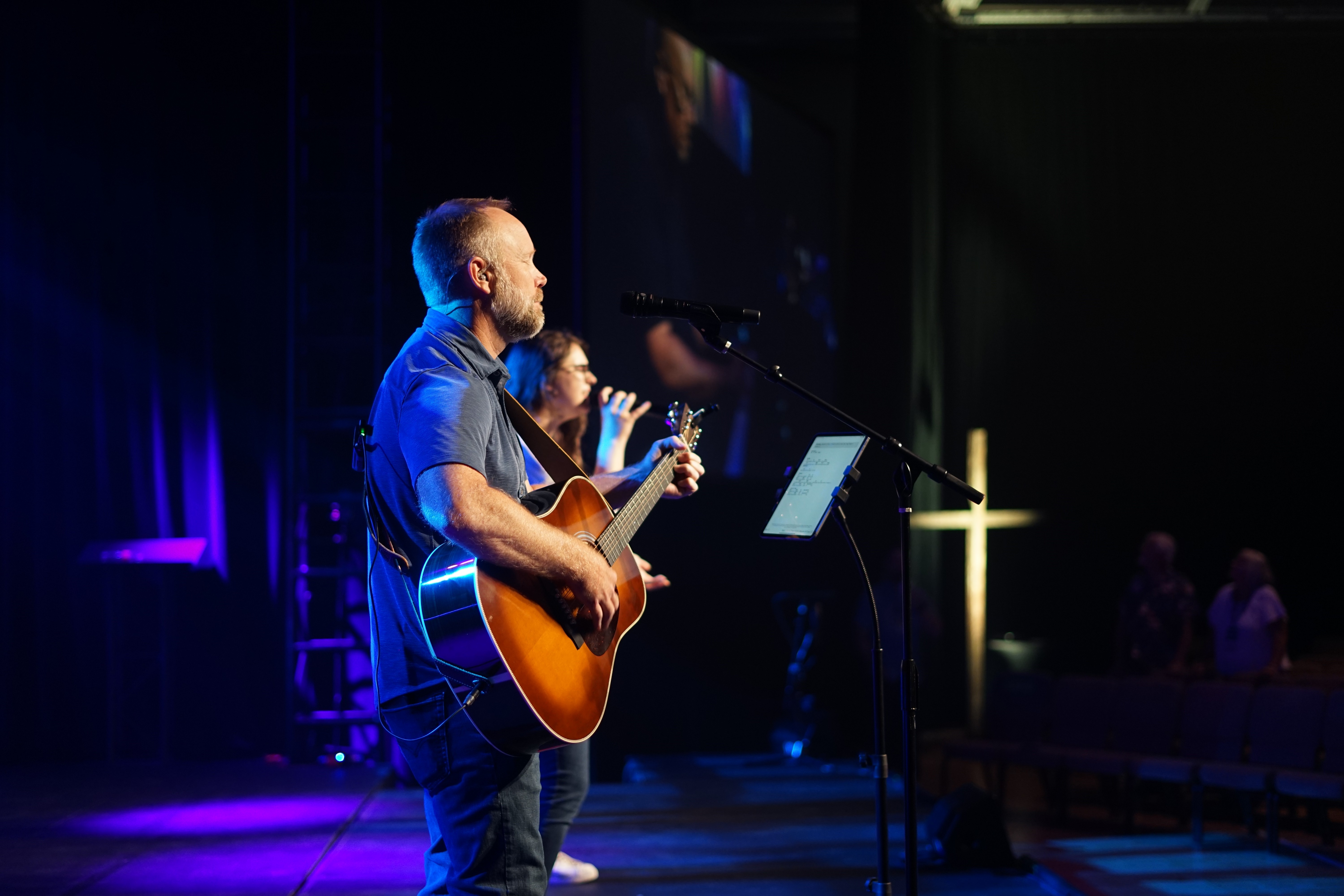 Large outdoor billboard amid trees, showing a purple-to-peach gradient background with the white text “Your mental health, simplified.” and a small purple gradient pill-shaped logo above the word “Circular.”
