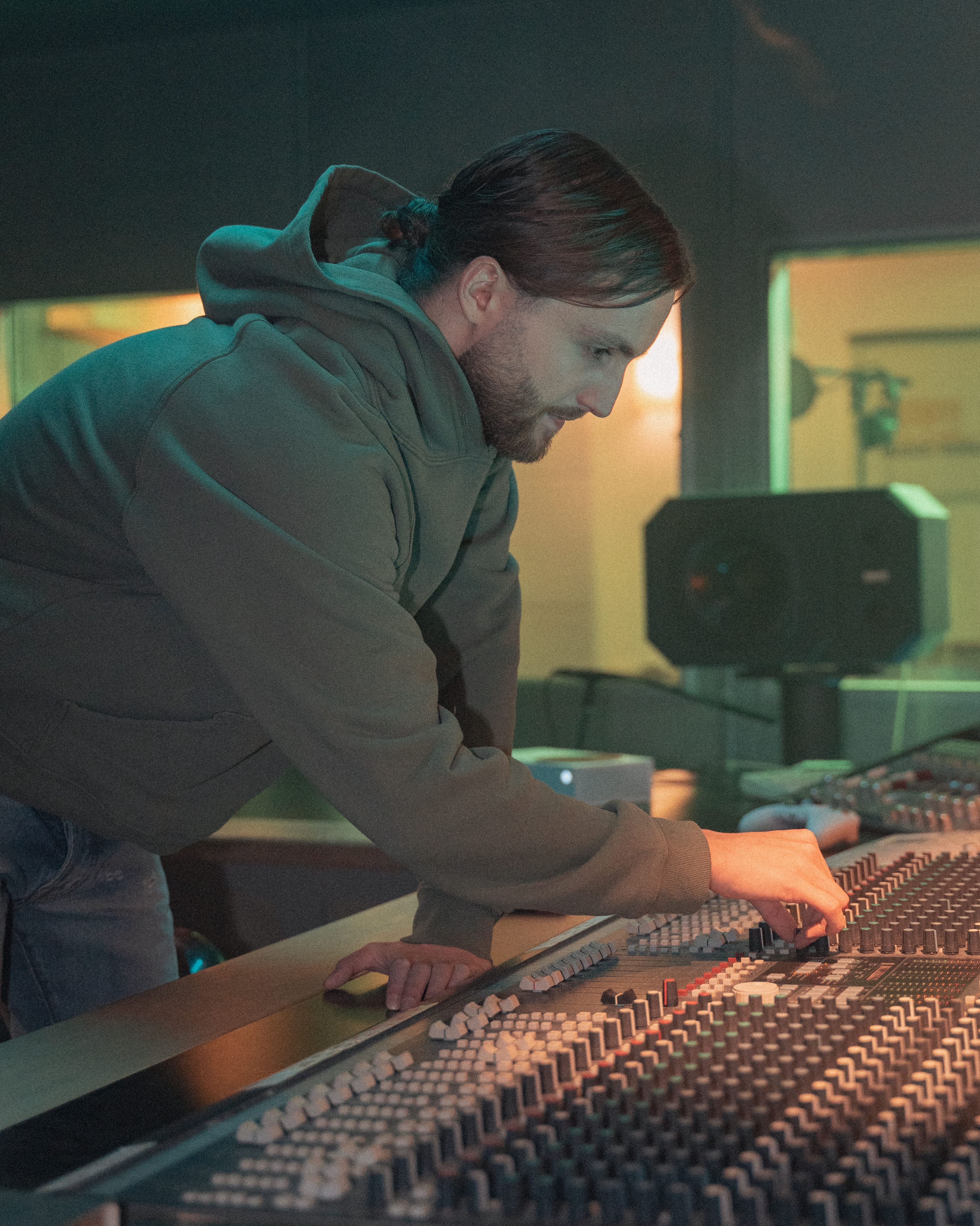 Streetside billboard with flyposters of the Batch.Works brand and illustrations