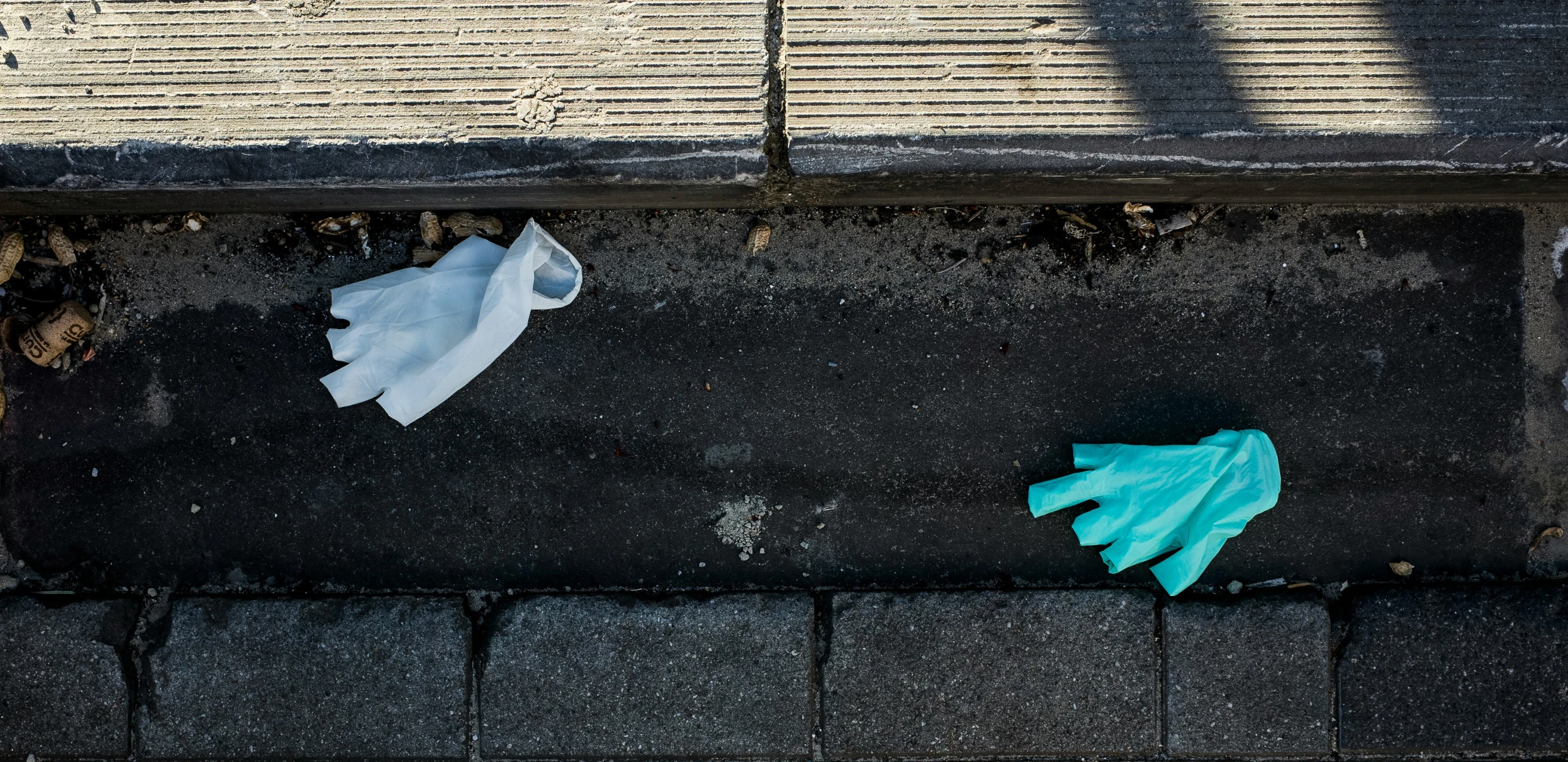 Annotated glove, bottle, and rubble