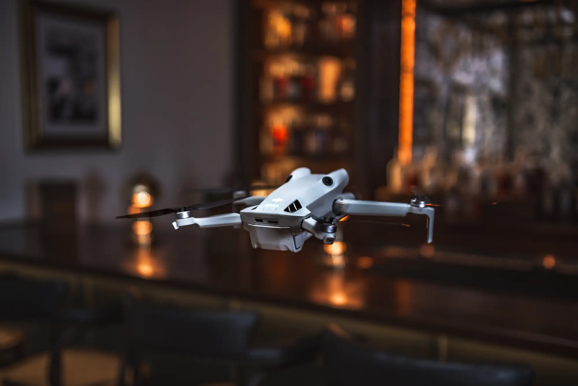 Drone pilot operating a controller during an aerial shoot