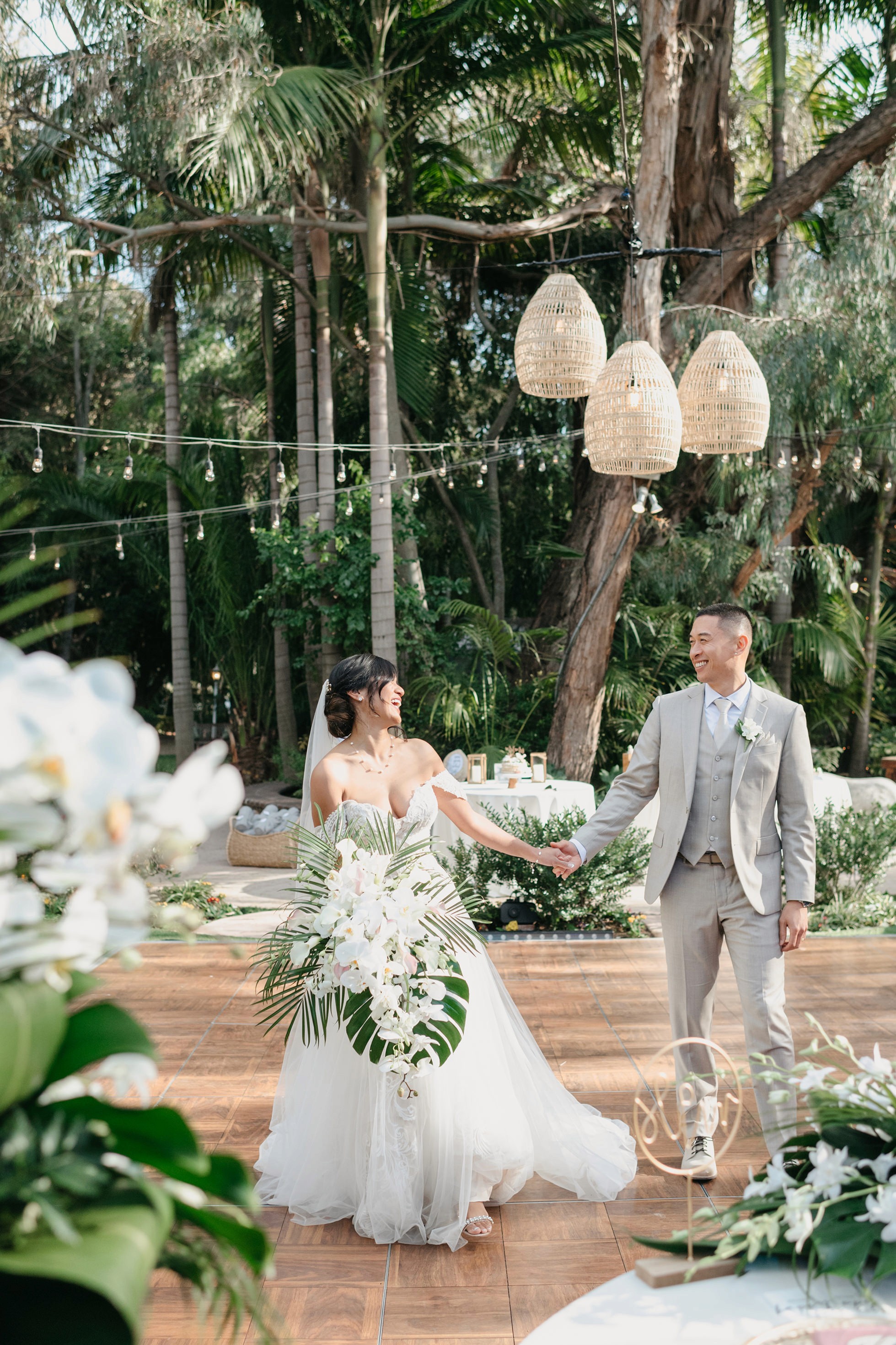 Outdoor wedding reception tablescape under the trees