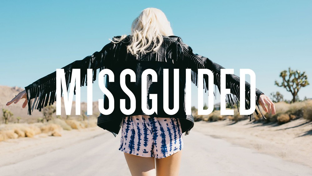 Missguided fashion brand promotional image with model outdoors