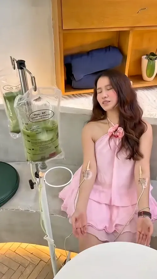 a green smoothie and a smoothie drink on a table