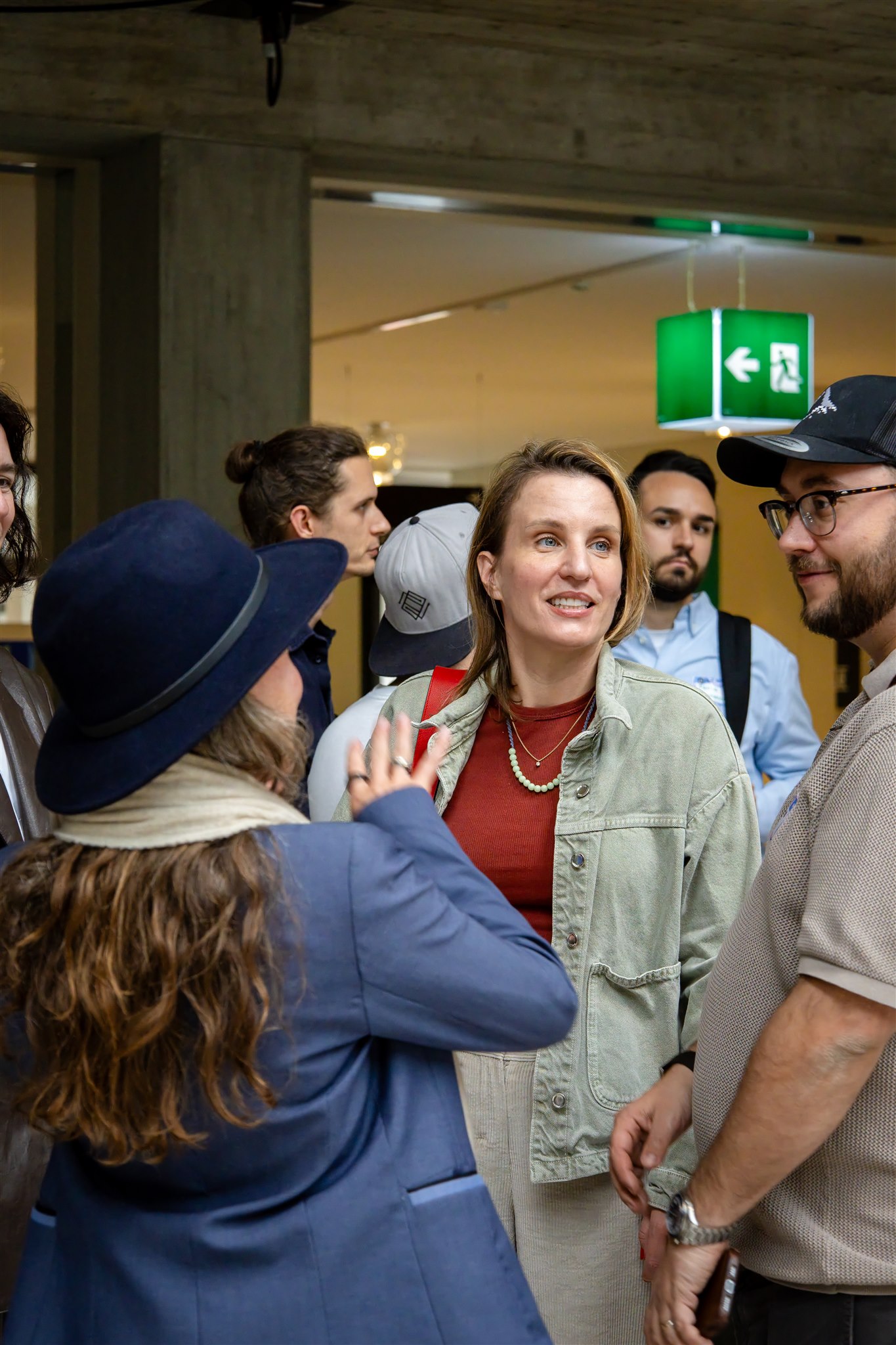 People networking during EthereumZüri event in Zurich venue