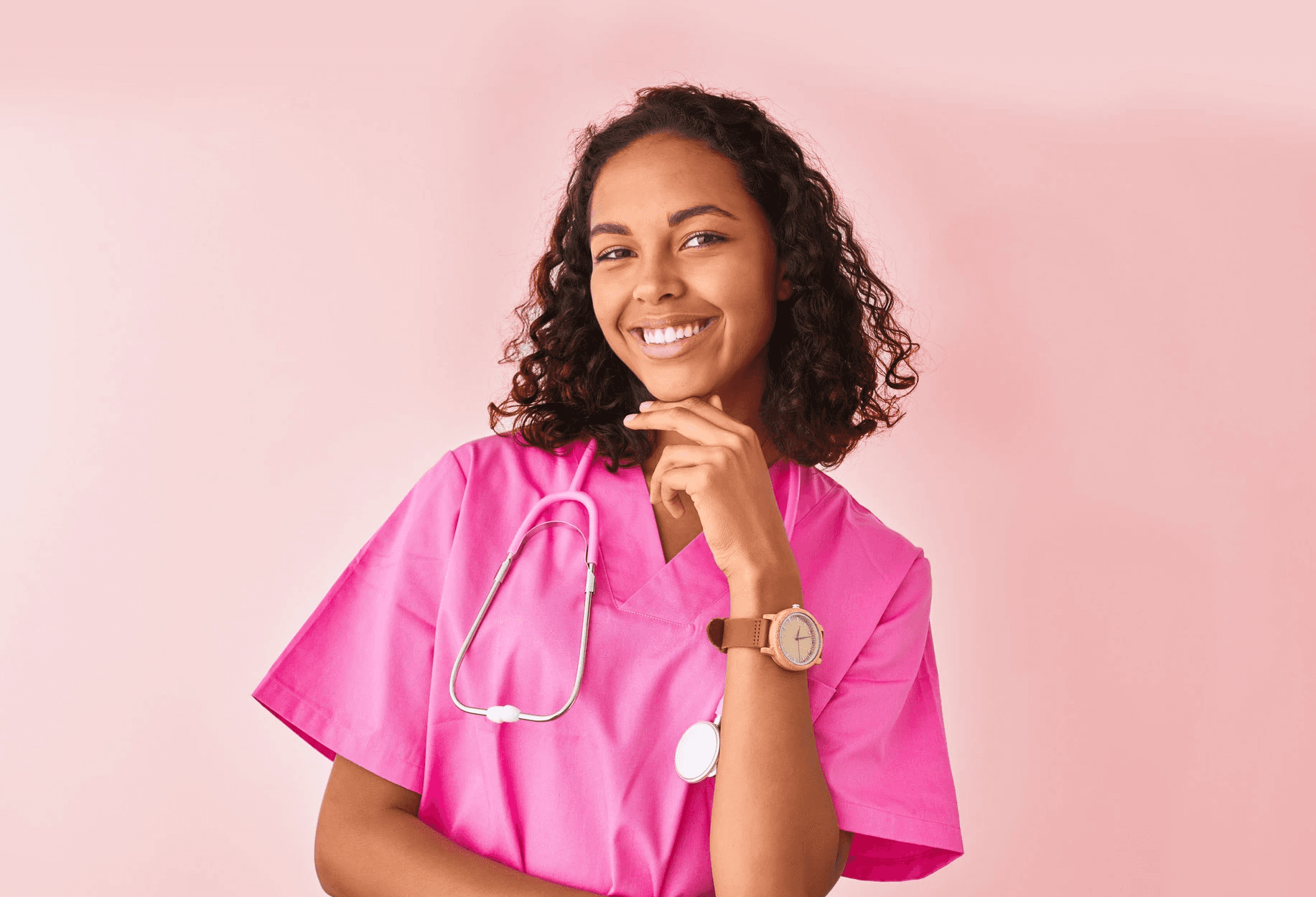 Two nurses in blue scrubs