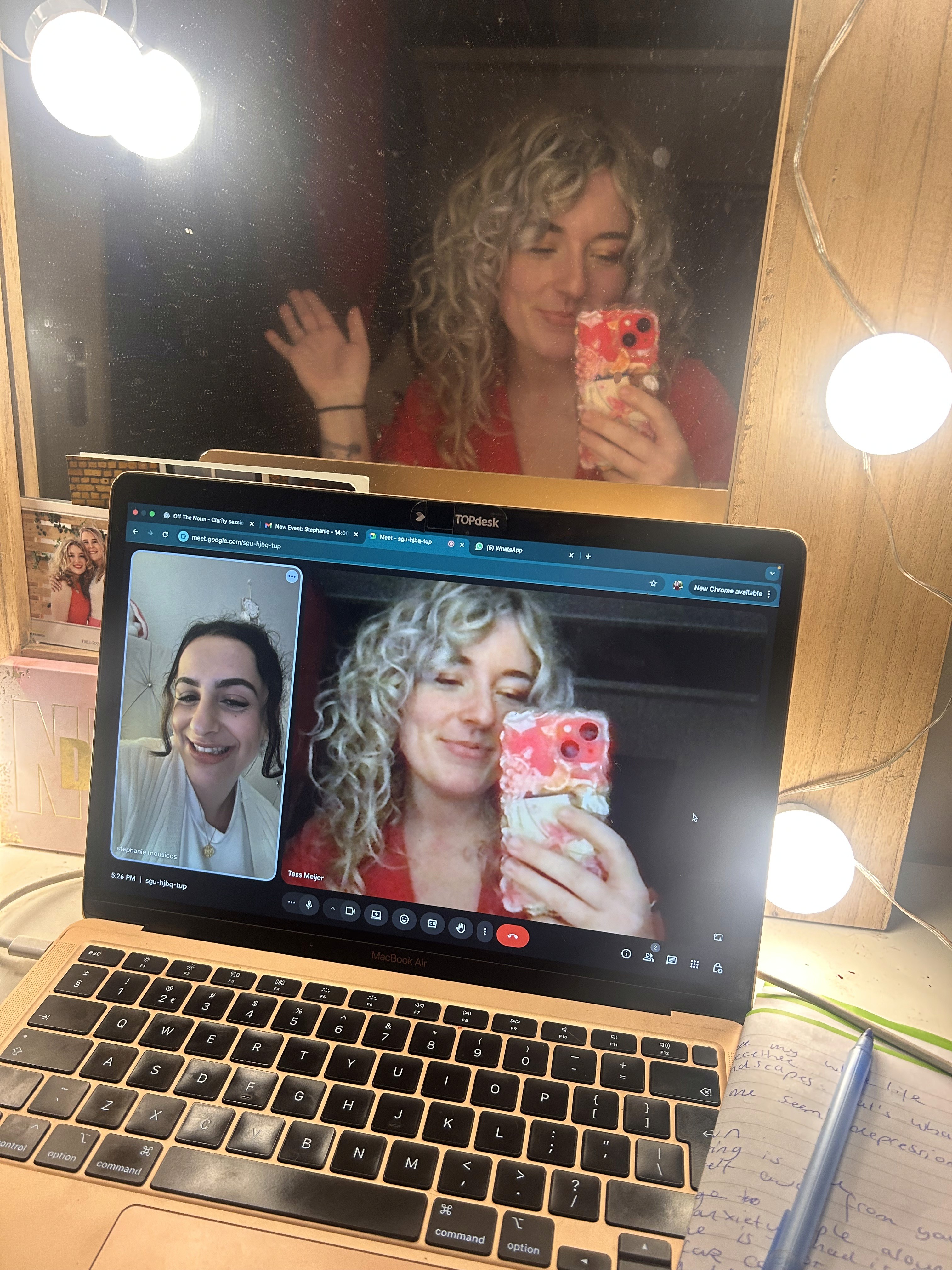 Tess Meijer & another traveler doing handstands in front of mountain peaks, representing balance, courage, and adventure.