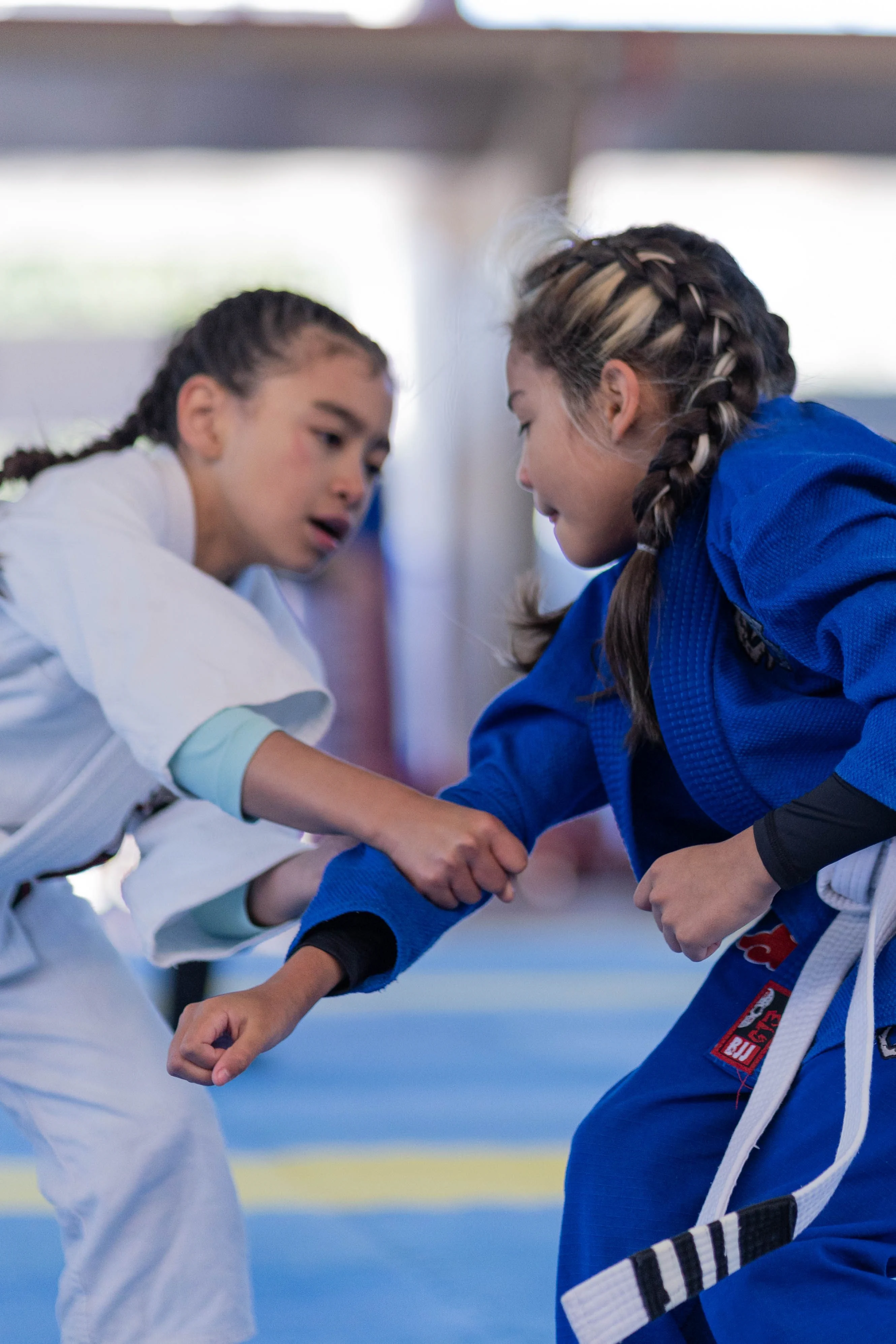 Children practicing Brazilian Jiu-Jitsu together at Rai Martial Arts.