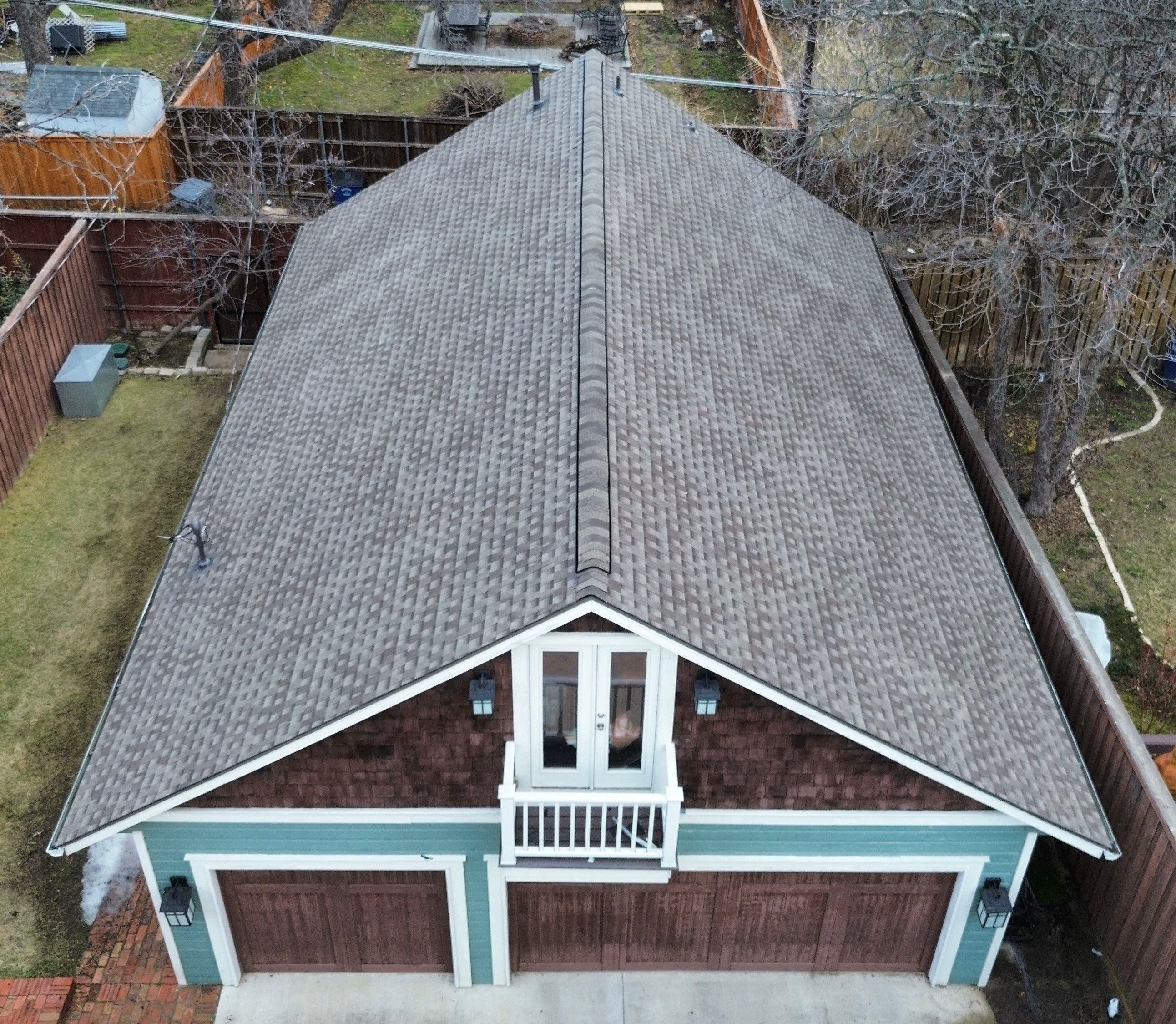 Aerial of a front gable end and louvered attic vent on the Winnetka Heights home with new ridge cap