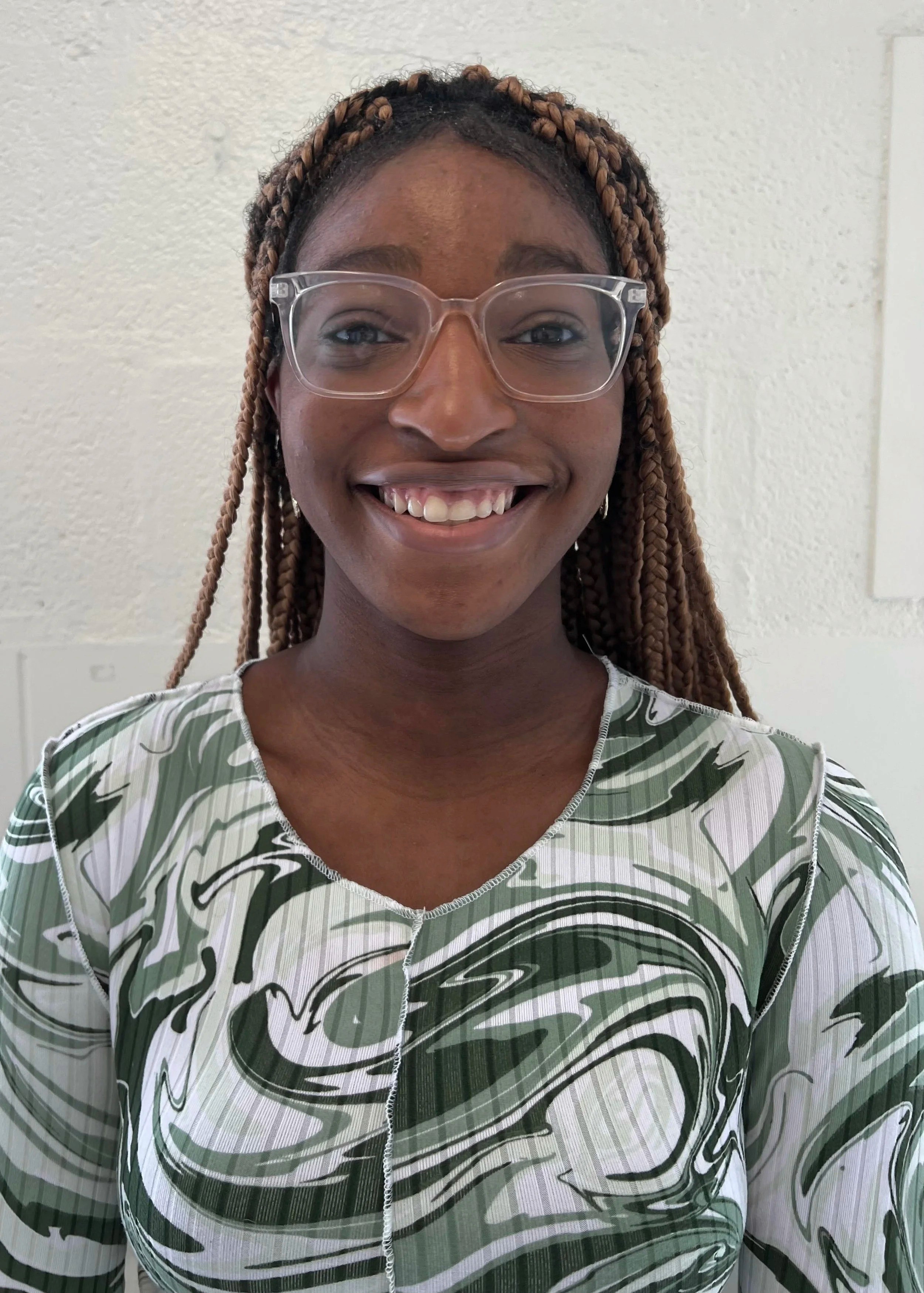 white man in a sweatshirt folding arms