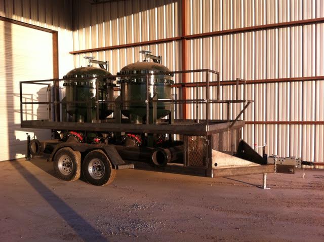 This process filter trailer was fabricated in our shop in Henderson, Texas.  The filter bodies, piping, and steel trailer were painted per client specifications after our welding services were completed.