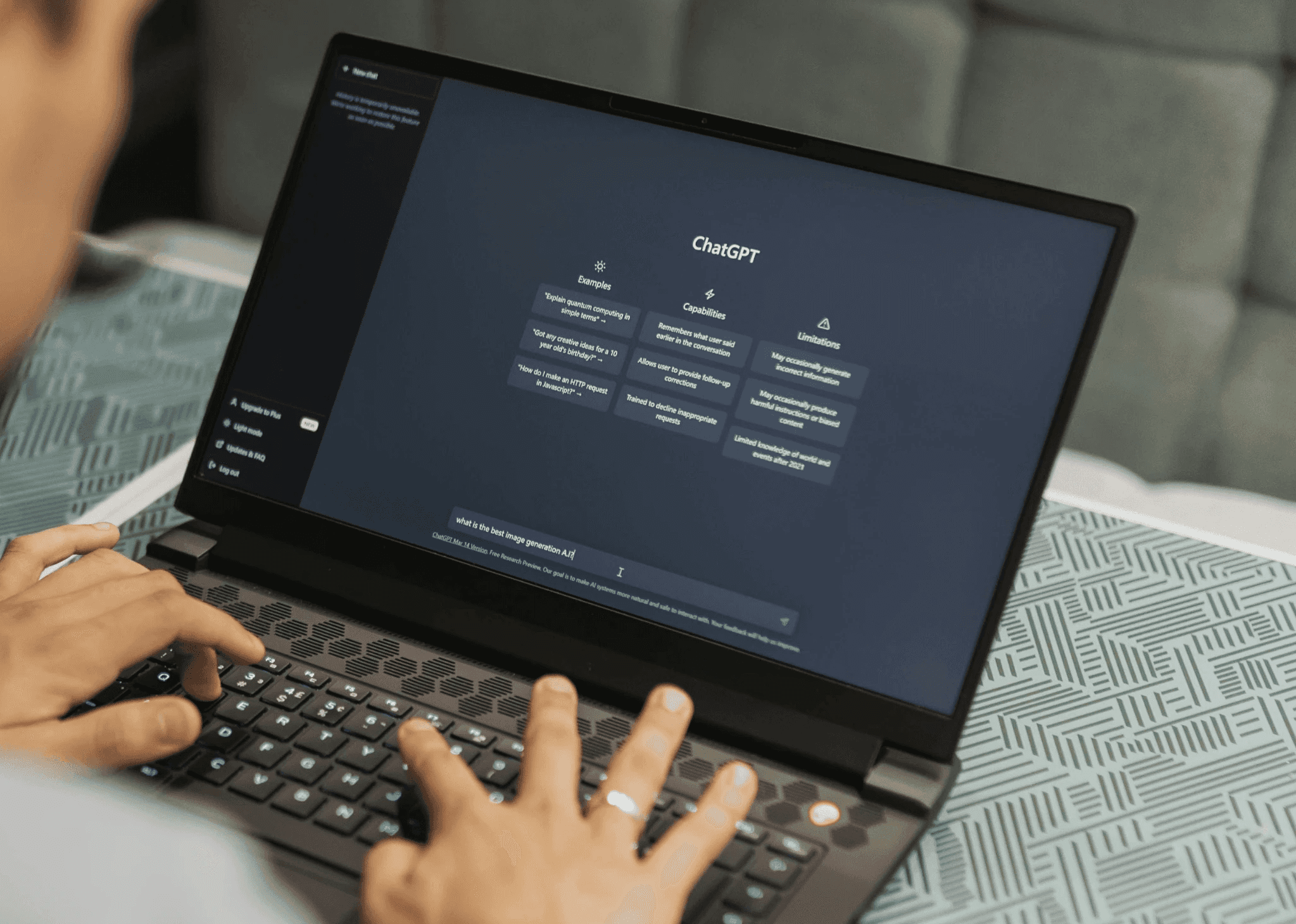 Man looks at data and statistics on a laptop