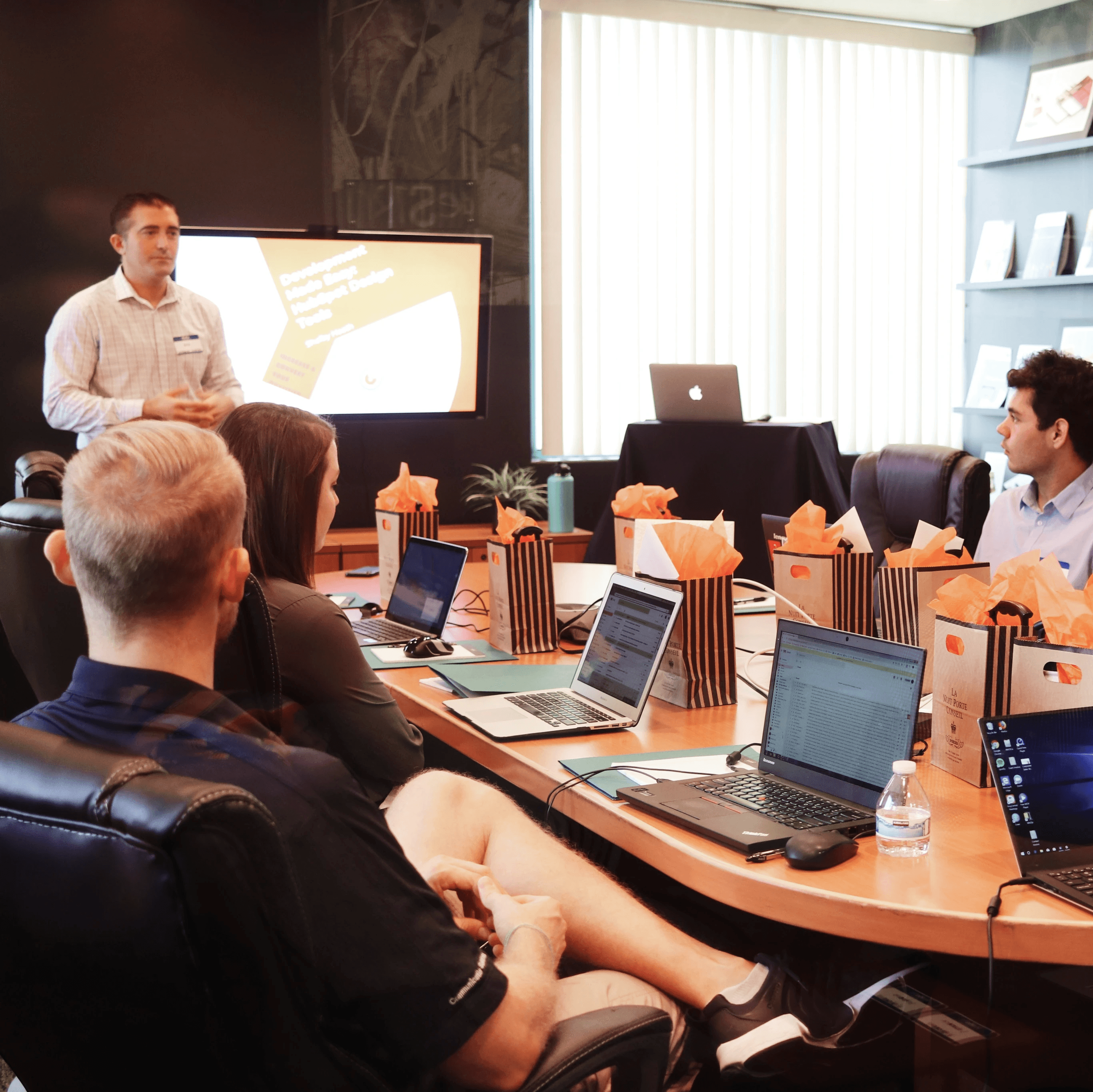 Engaged sales team attending a talent intelligence presentation.