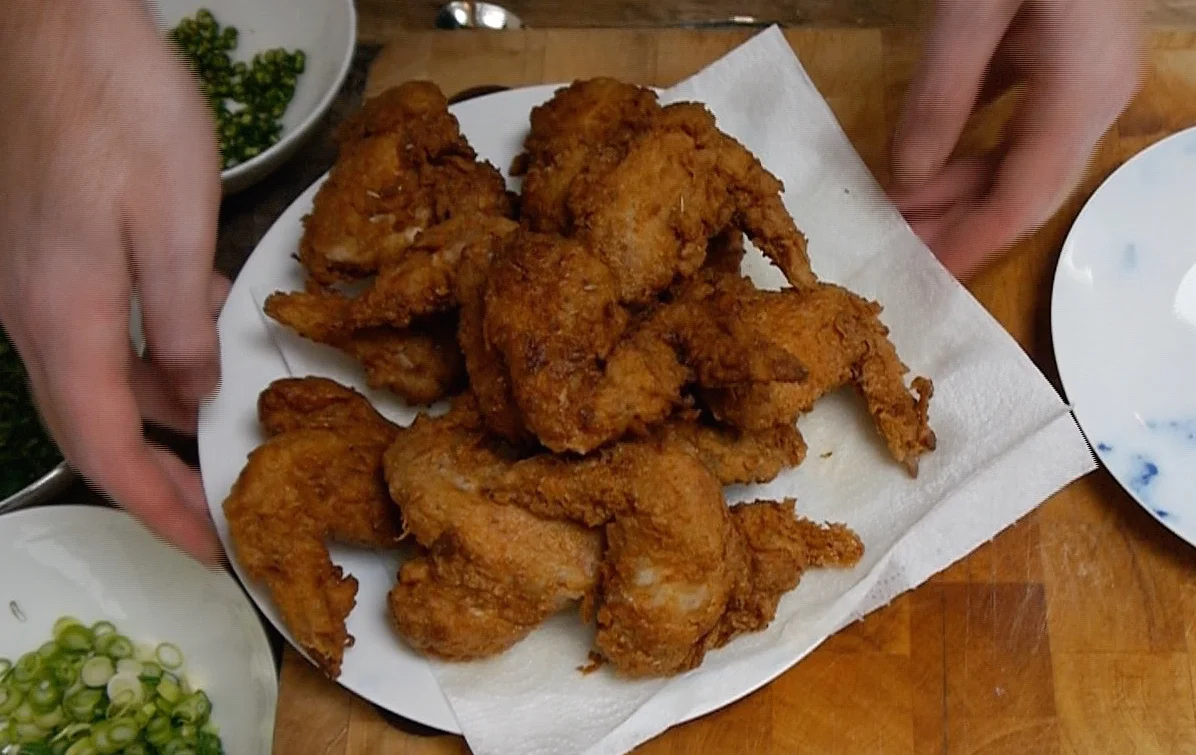 Fried chicken wings on a plate