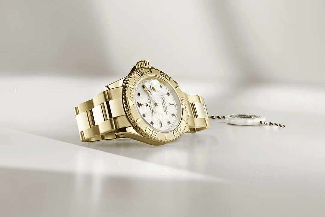 husband and wife working happily on a laptop