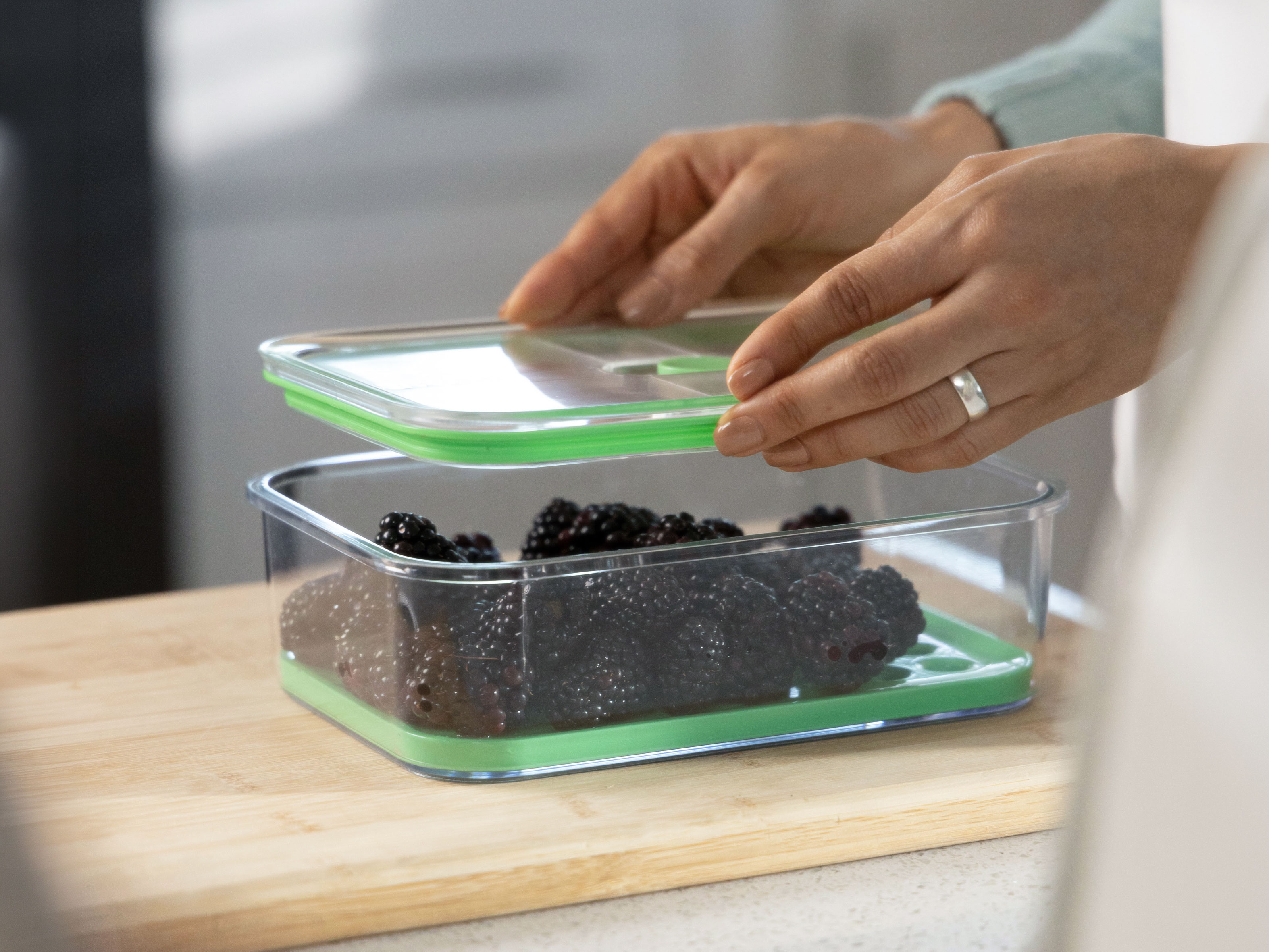 Streetside billboard with flyposters of the Batch.Works brand and illustrations