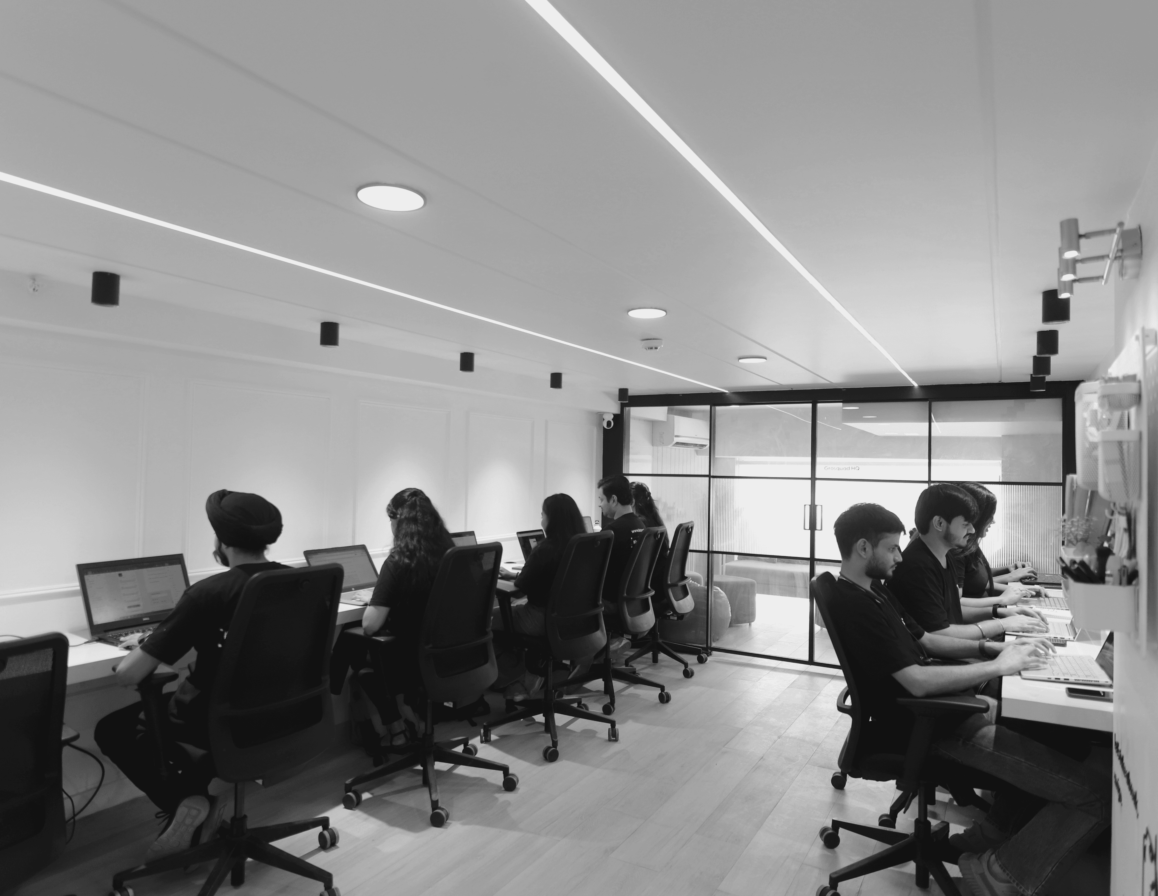 Group of people relaxing outdoors on a field or lawn