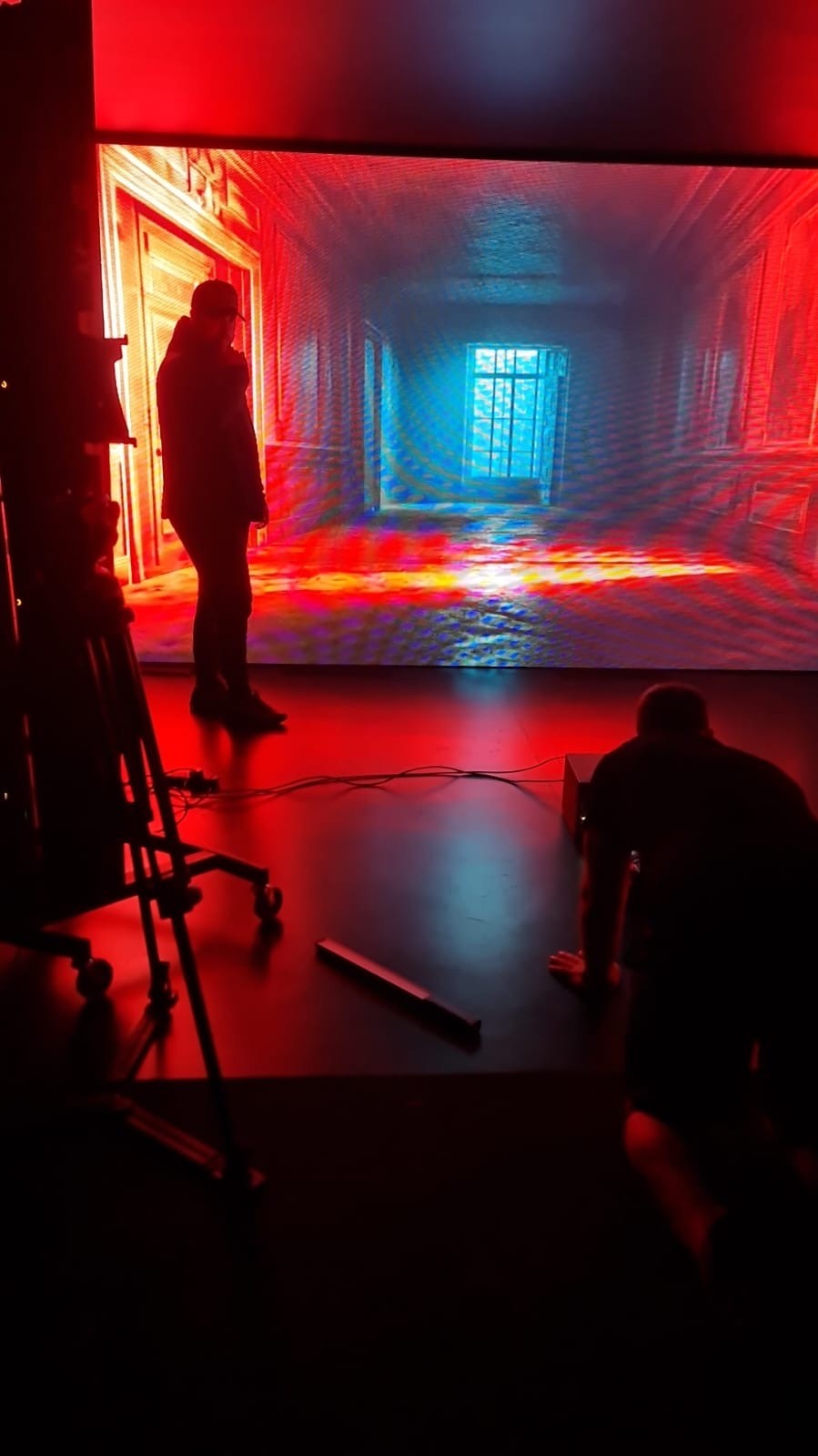 a man smoking a cigarette in a black and white photo