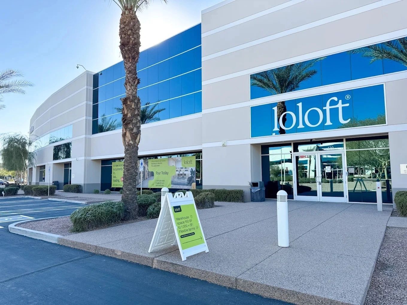 a black and white living room with a large tv