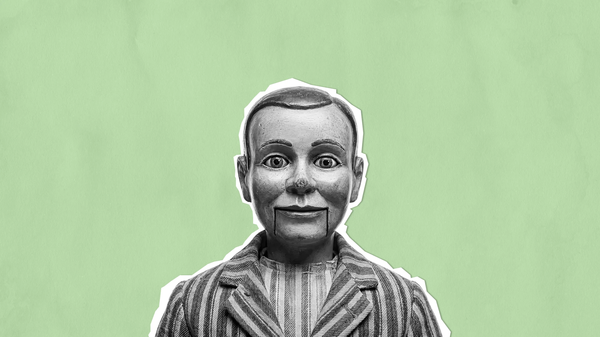 Vintage ventriloquist dummy with a fixed smile, representing users giving polite but fake feedback during interviews.