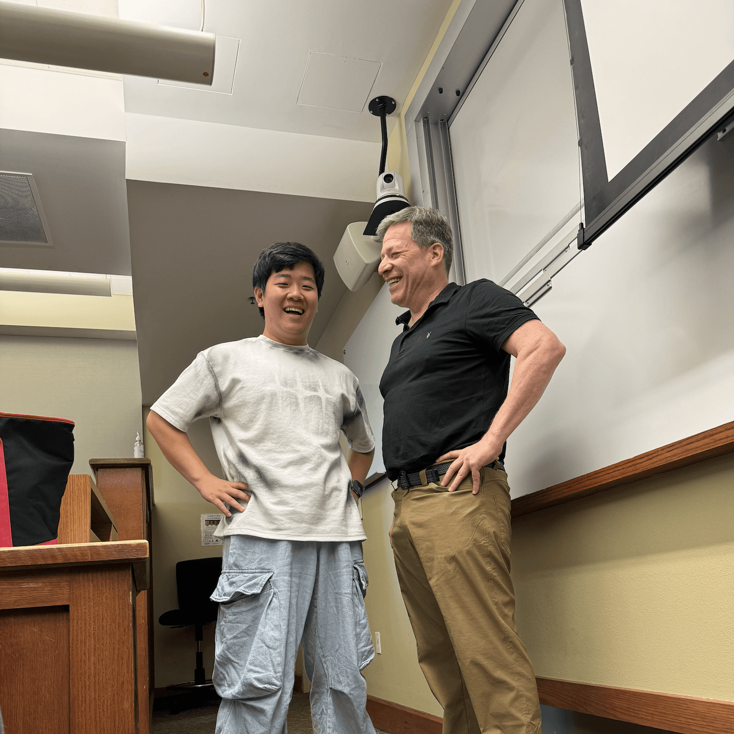 silver iMac turned on inside room