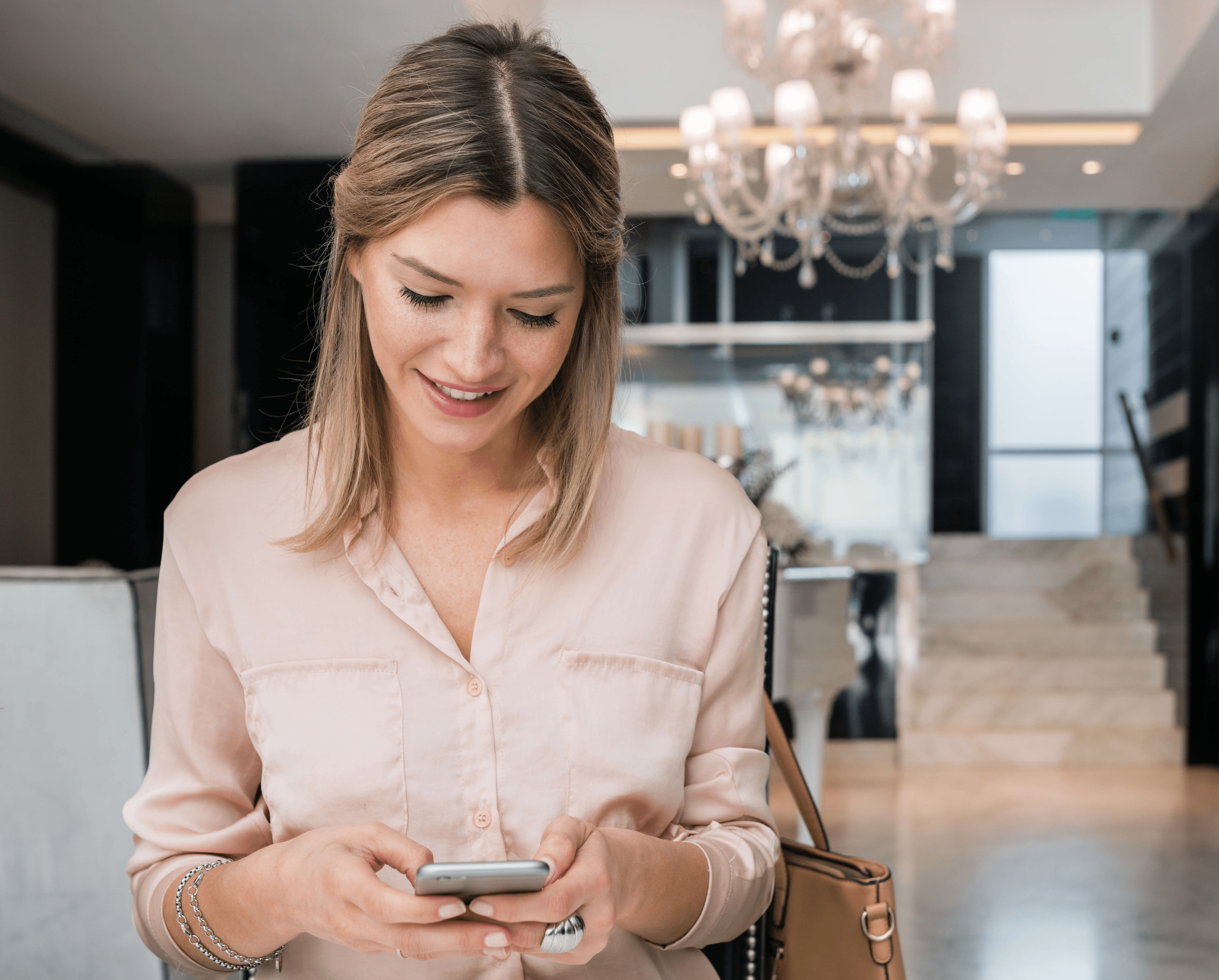 A local business owner reviewing AI-generated blog content on her phone
