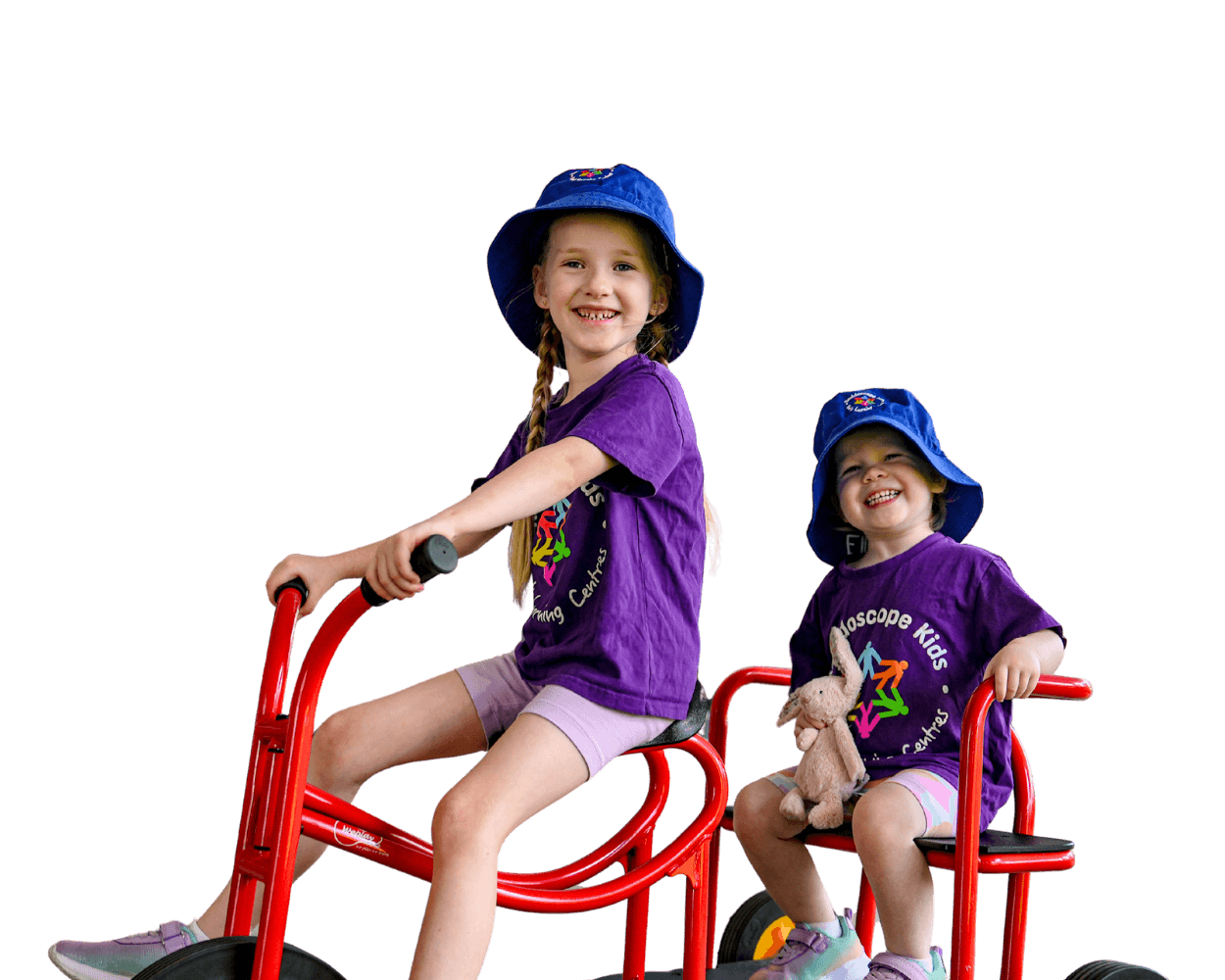 Two children in blue and yellow Kaleidoscope Kids uniforms playing during a kindergarten activity