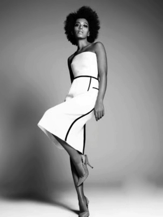 Woman in Teal Setting