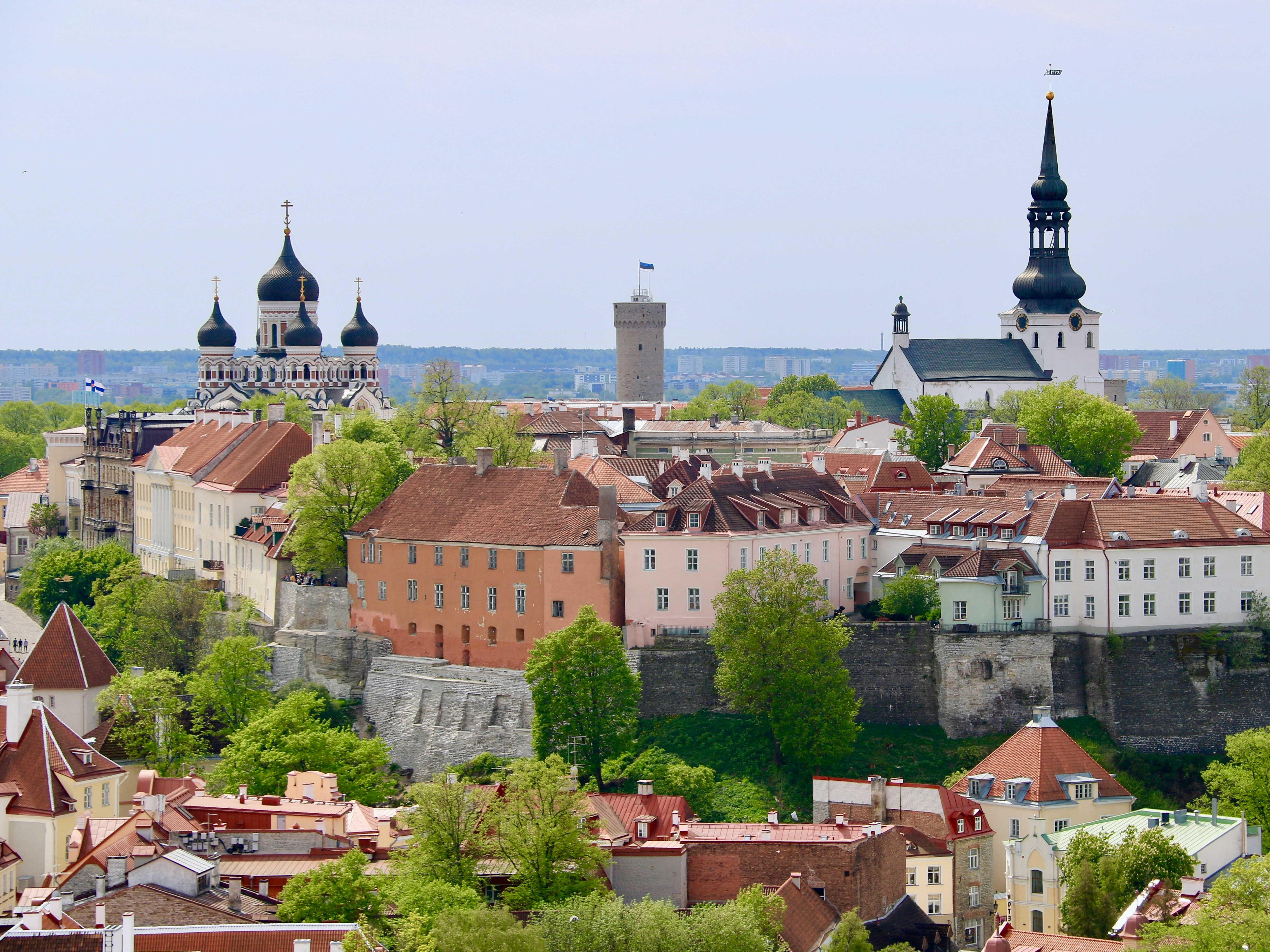 a view of a city from a hill