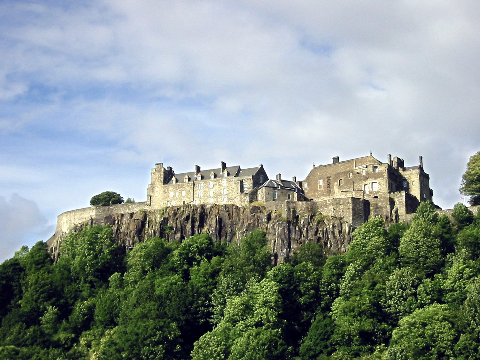architectural photo of tower between buildings