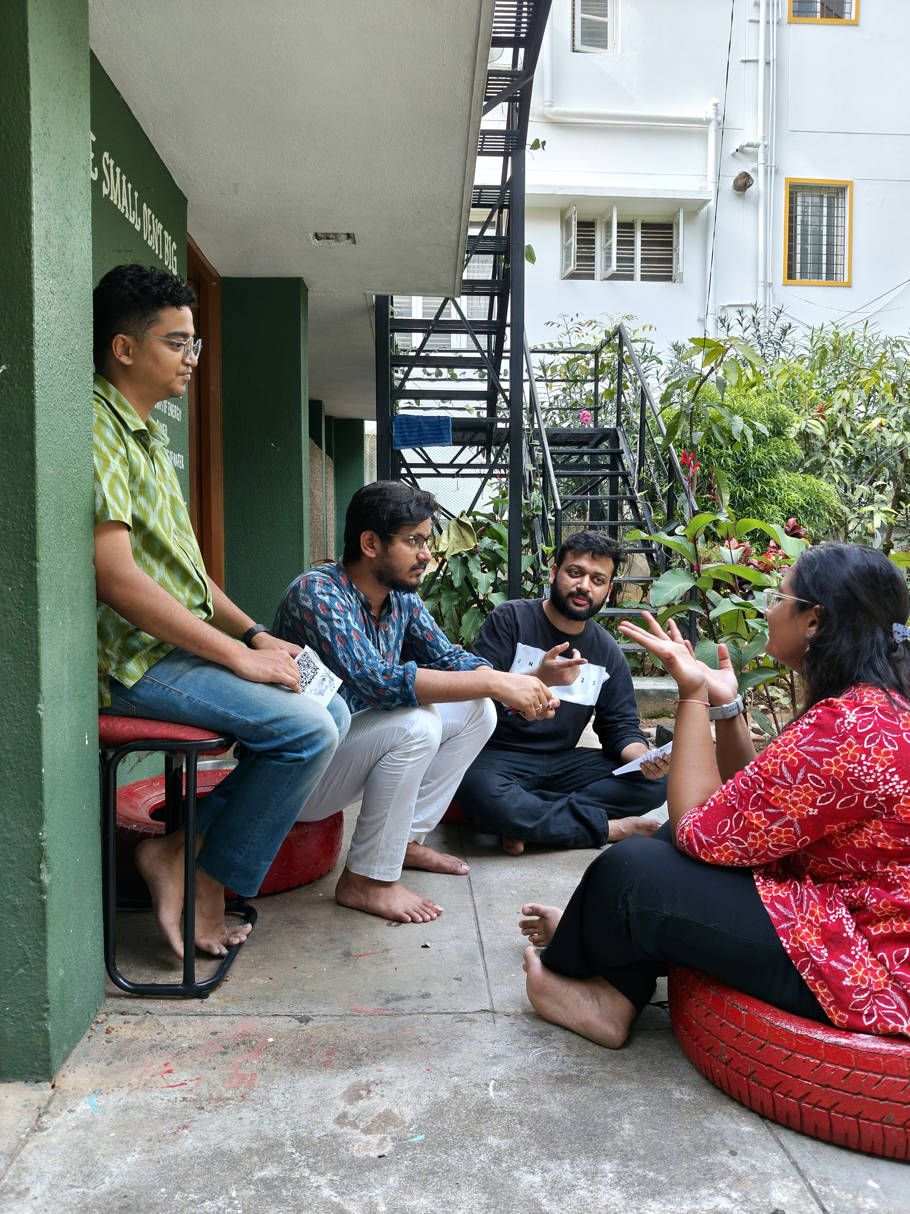 A set of team members interacting with each other at a SolverJam hosted by Awaaz Leadership Labs