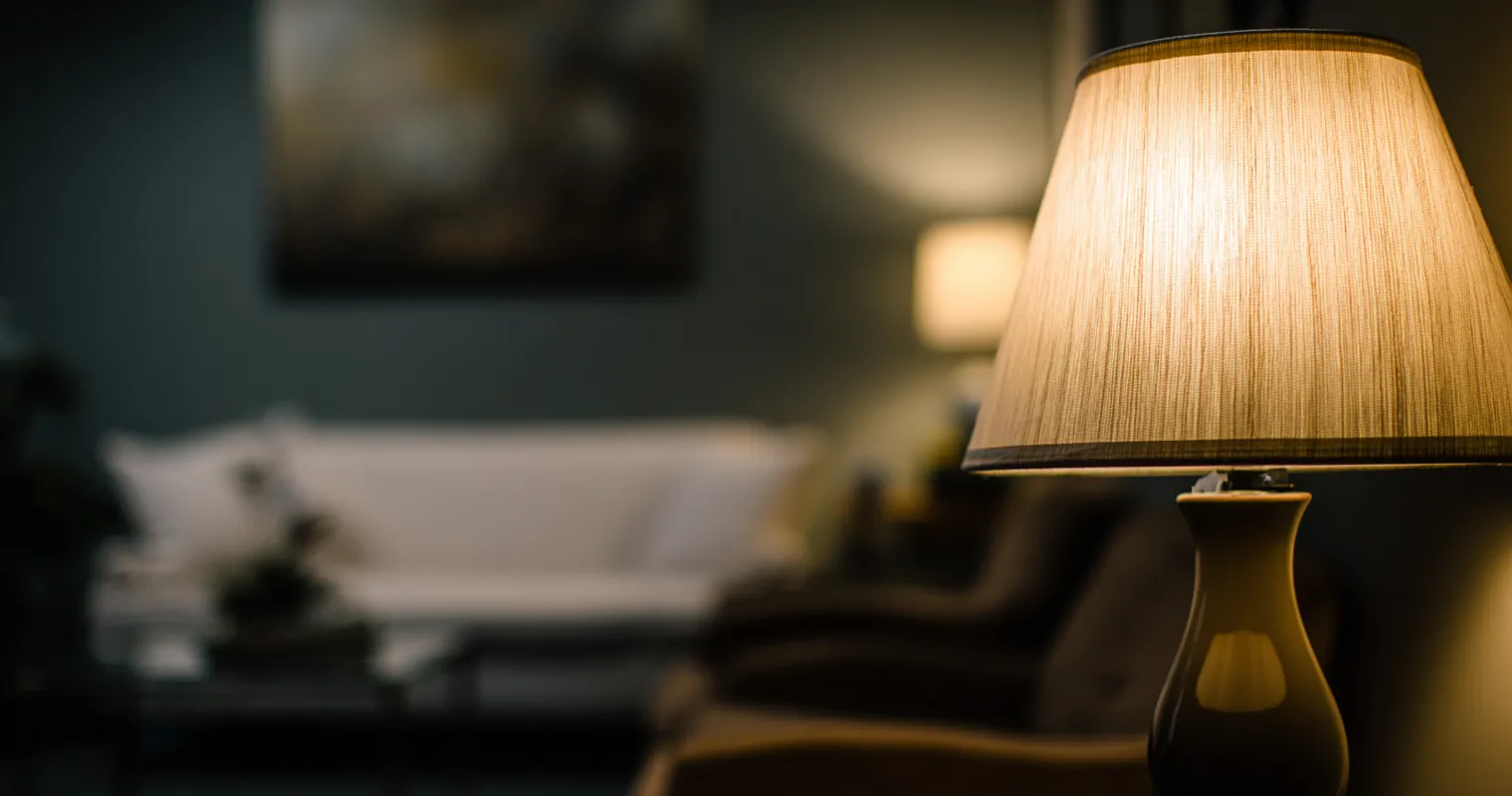 Warm, inviting therapy room with modern furniture and lamp lighting