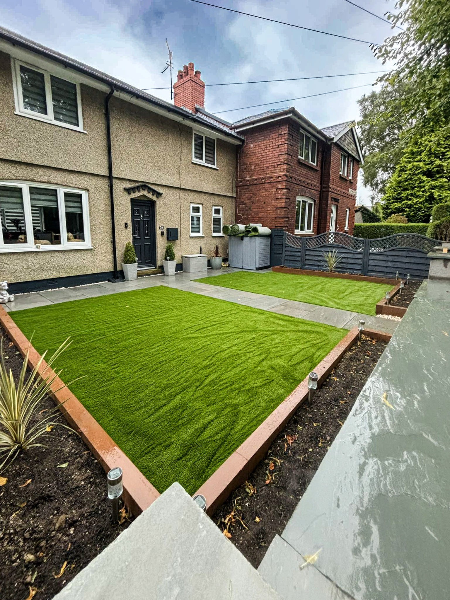 modern hillside home at sunset