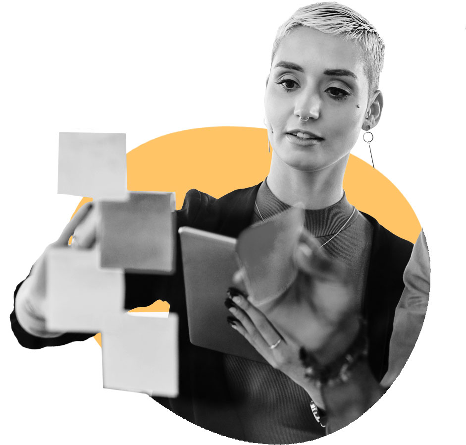 Two coworkers reviewing work they're excited about