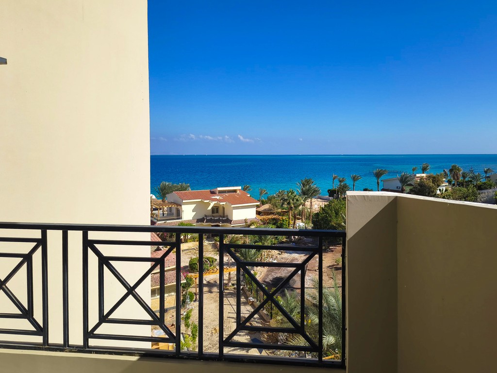 white and brown concrete building under blue sky during daytime