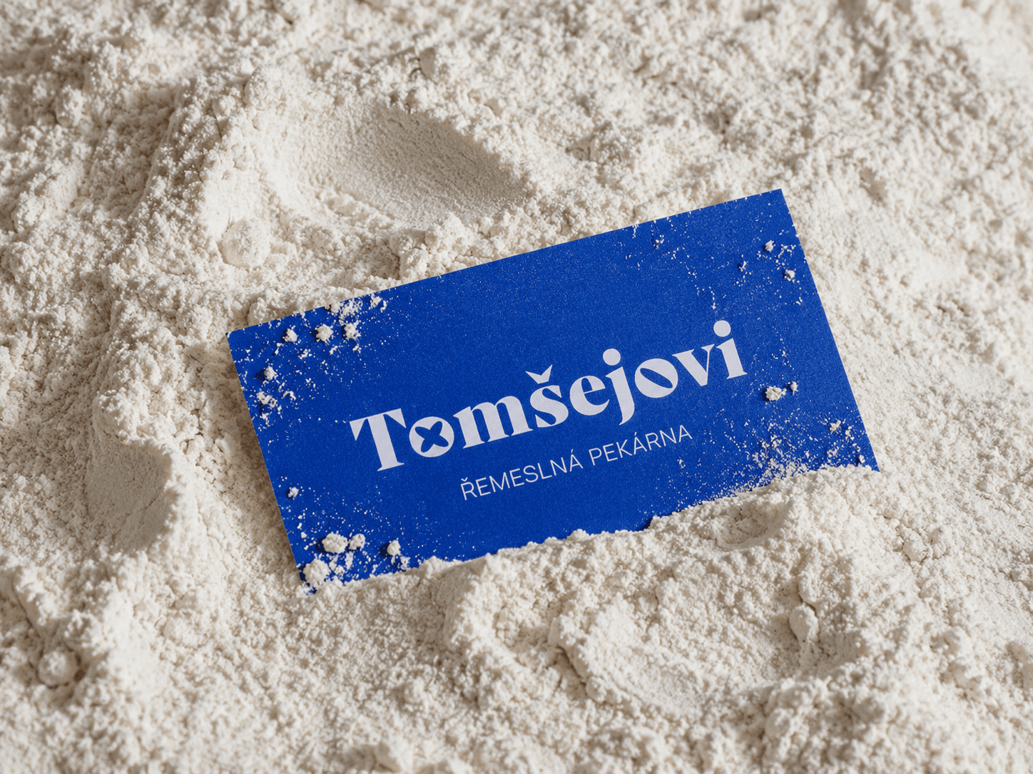 Tomšejovi artisan bakery branding across bread packaging and shop touchpoints