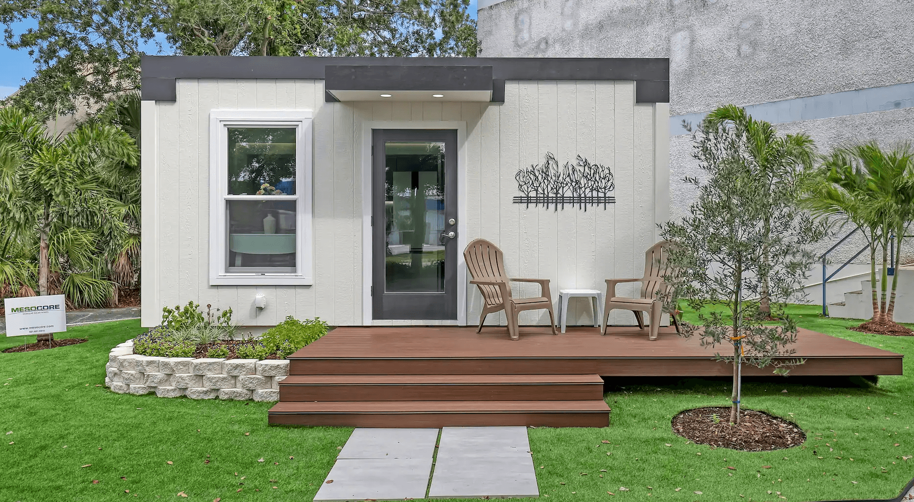 Prefab ADU exterior design with flat roof and front porch