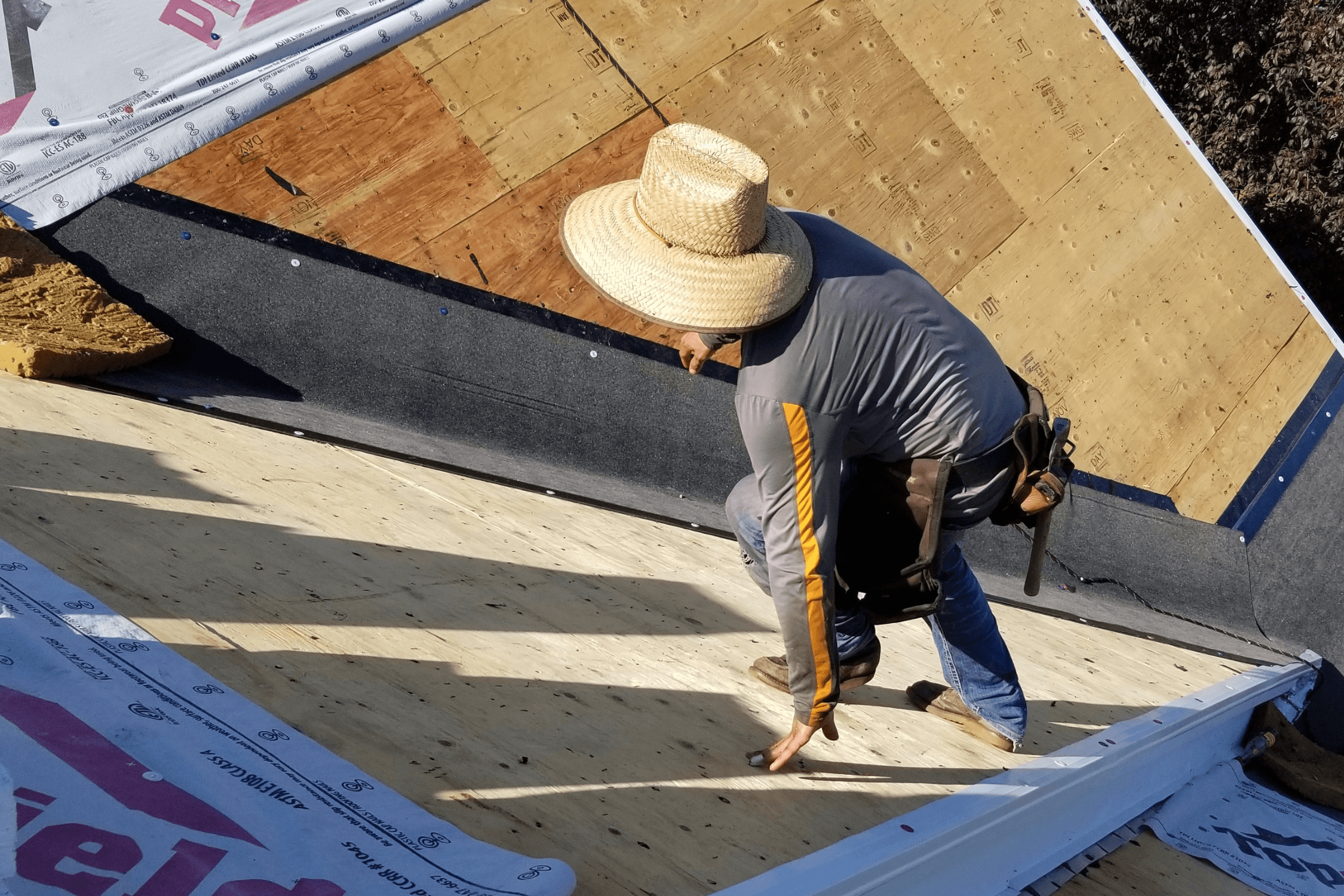 Roofer walking up roof on steep 10/12 pitch in Liberty, Missouri