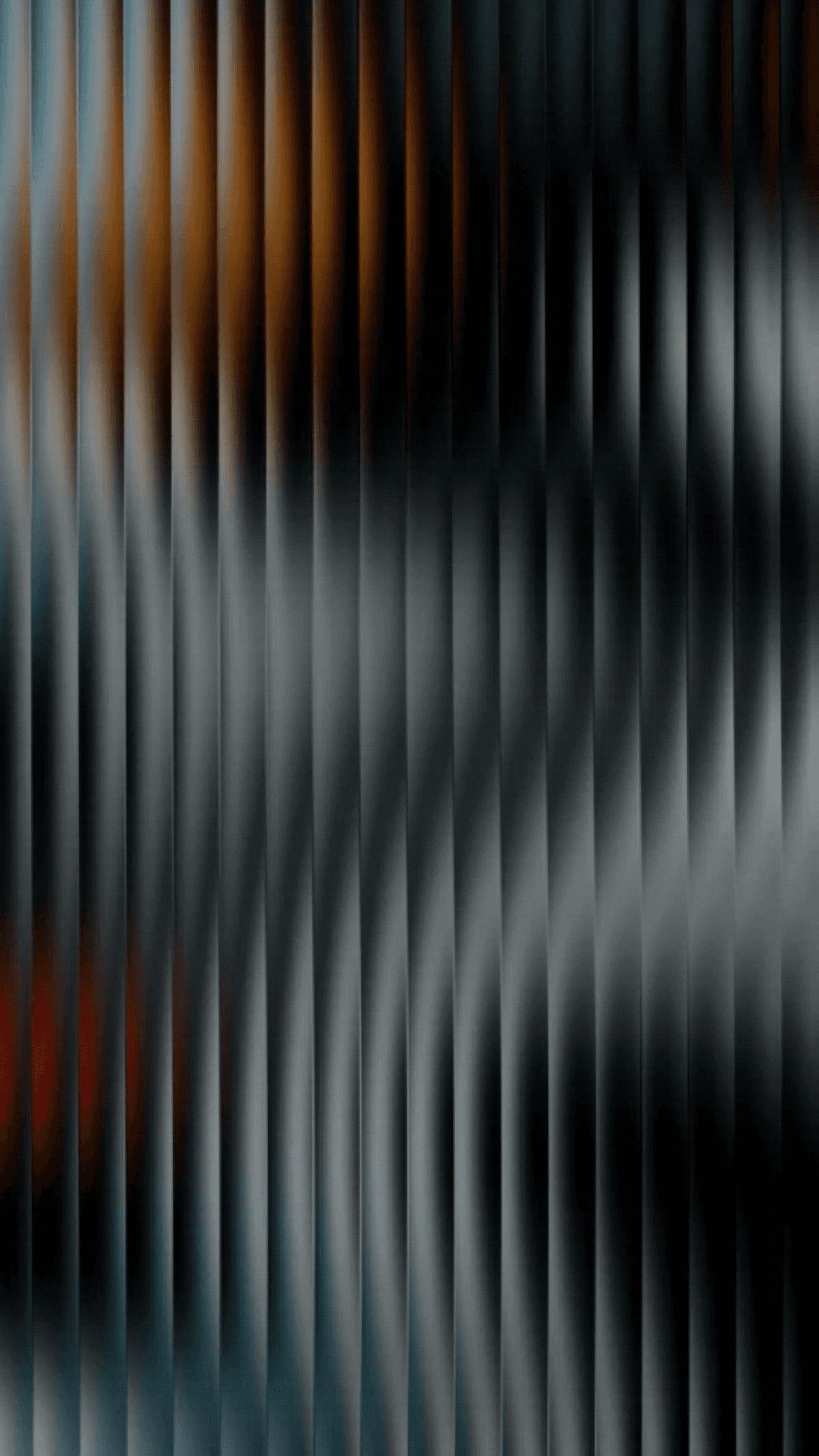 Team collaborating around a laptop during an SEO strategy meeting.