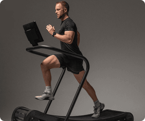 An athelete running on a NOHRD treadmill that has a tablet mounted on it that is powered by MoveLab Studio
