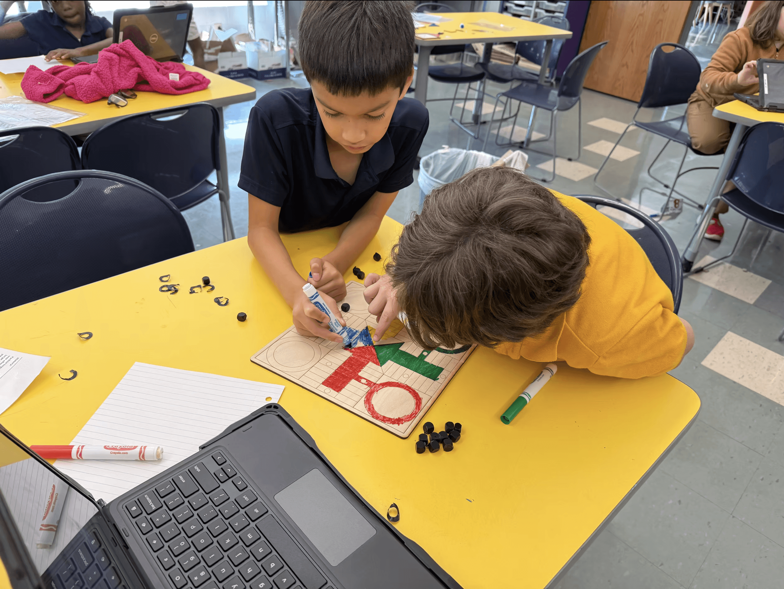 Students working on a project for eLab at Battle Academy.
