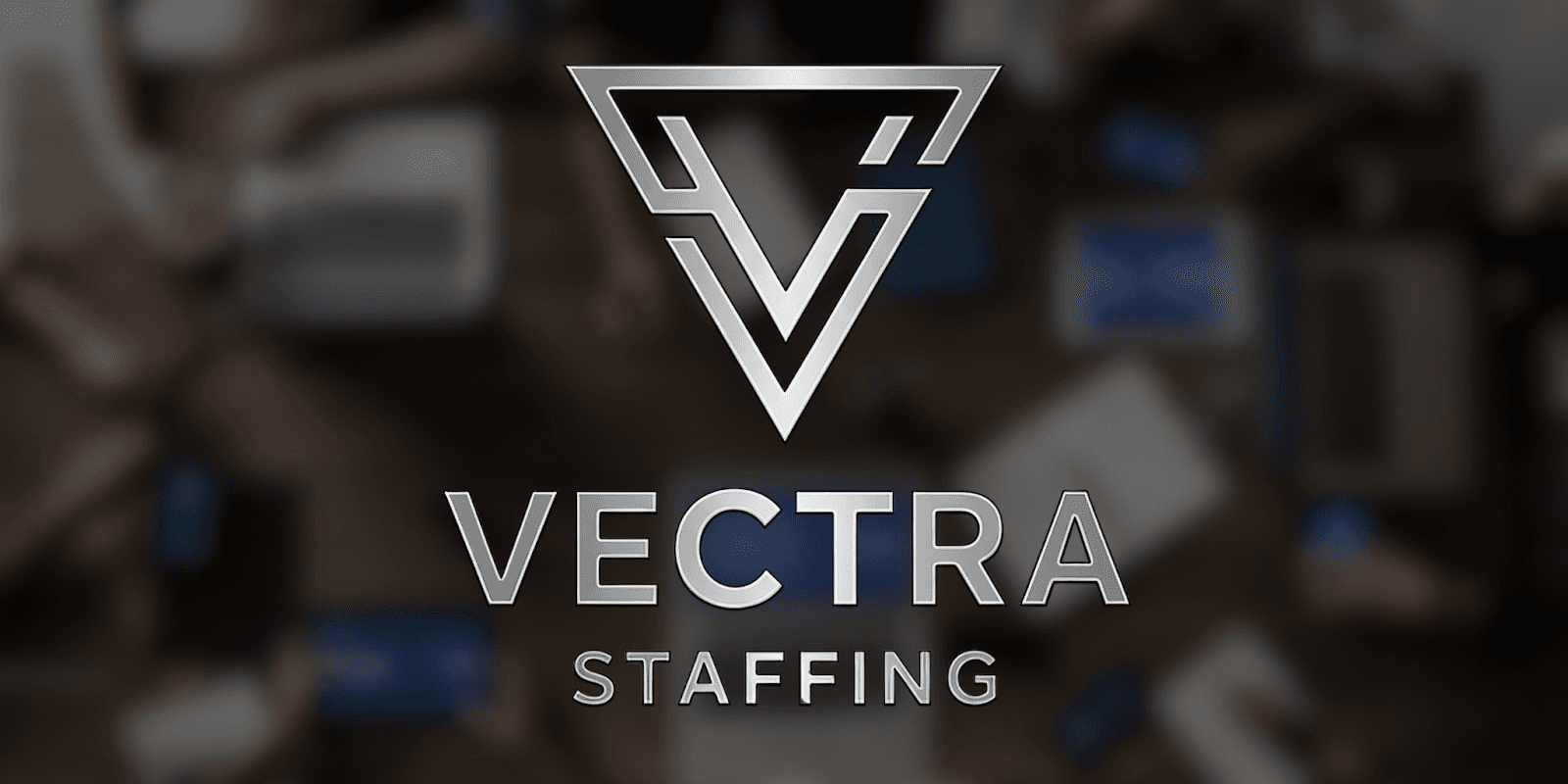 Vectra Staffing team collaboration with logo highlights their global recruitment solutions, combining career advisory and tailored talent services.