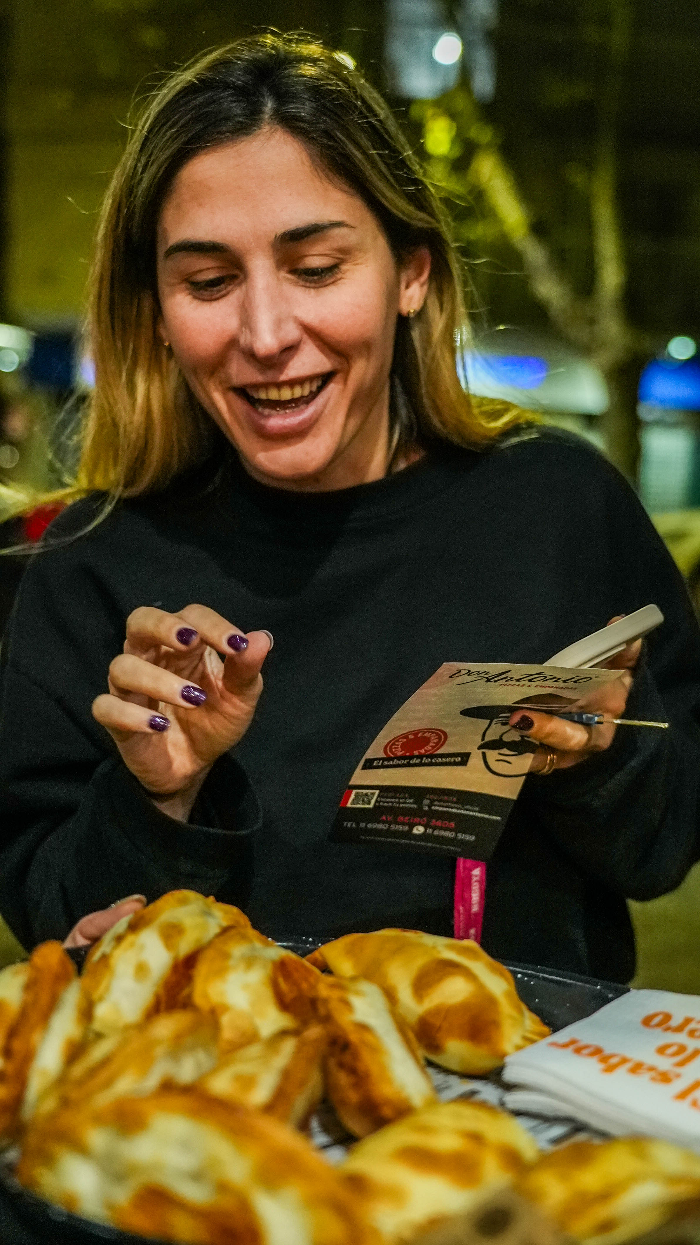 Man in glasses eating food from bowl