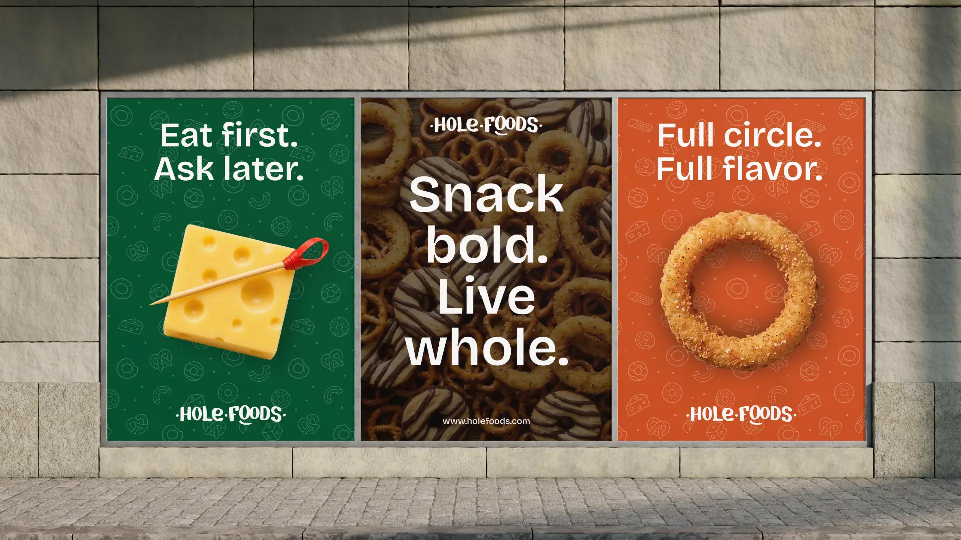 Hands stacking cardboard Hole Foods shipping boxes in front of a delivery truck.