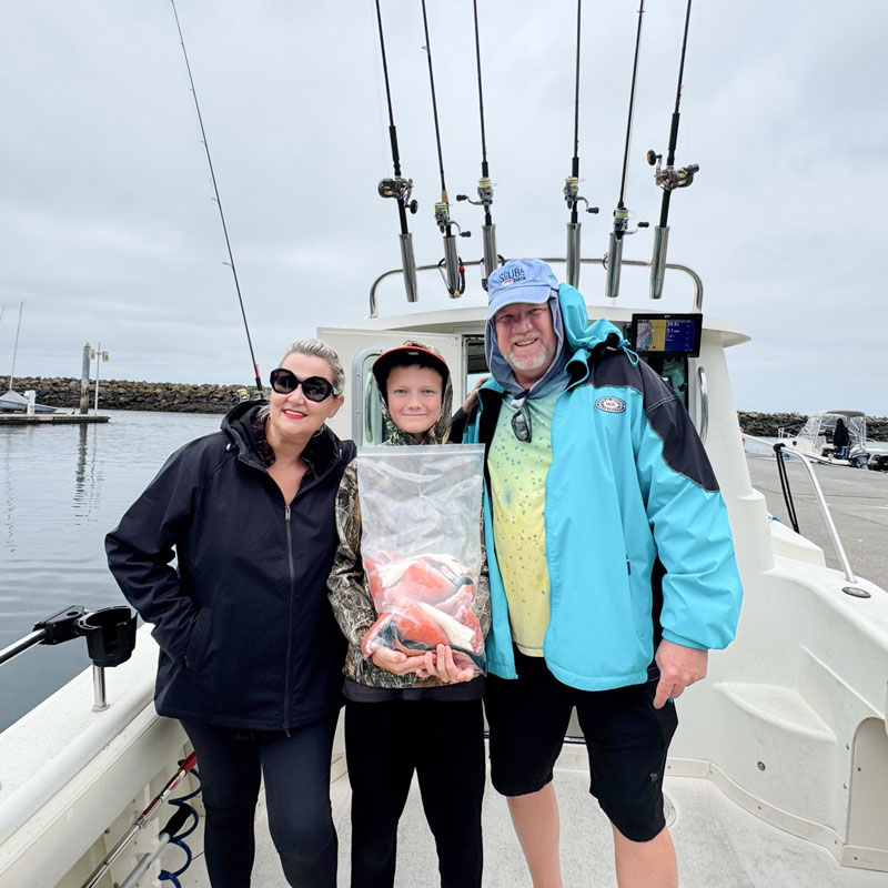 Grandparents with grandchild on a boat